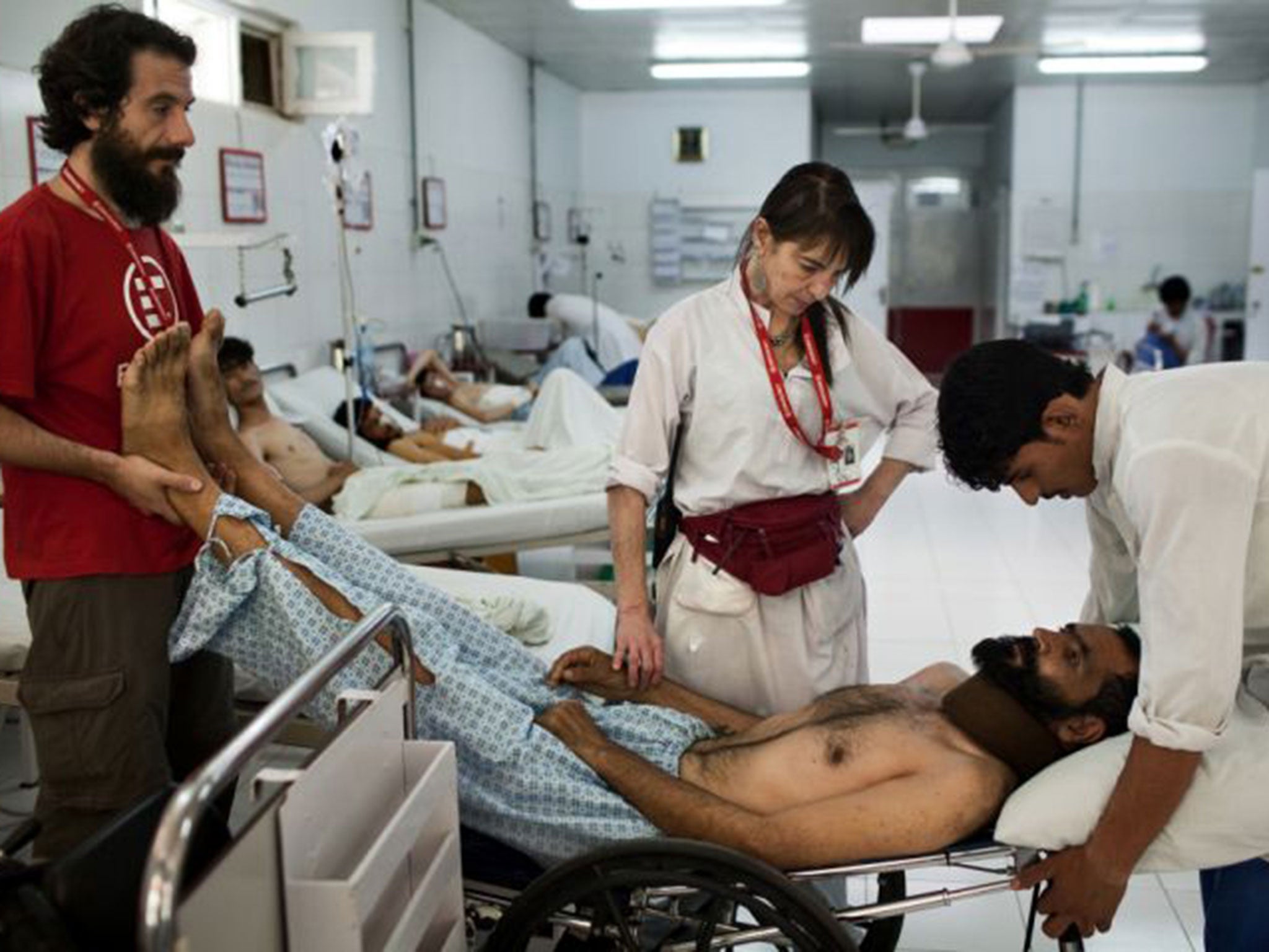 Said Jan Agha, 45, a police officer who was shot in the spine during a gun battle with the Taliban, receives care at the Surgical Centre for War Victims in Lashkar Gah