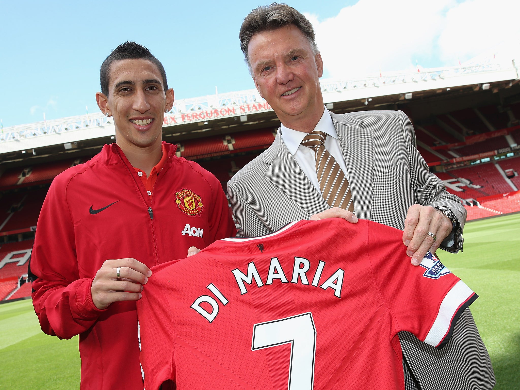 Angel Di Maria together with Louis van Gaal