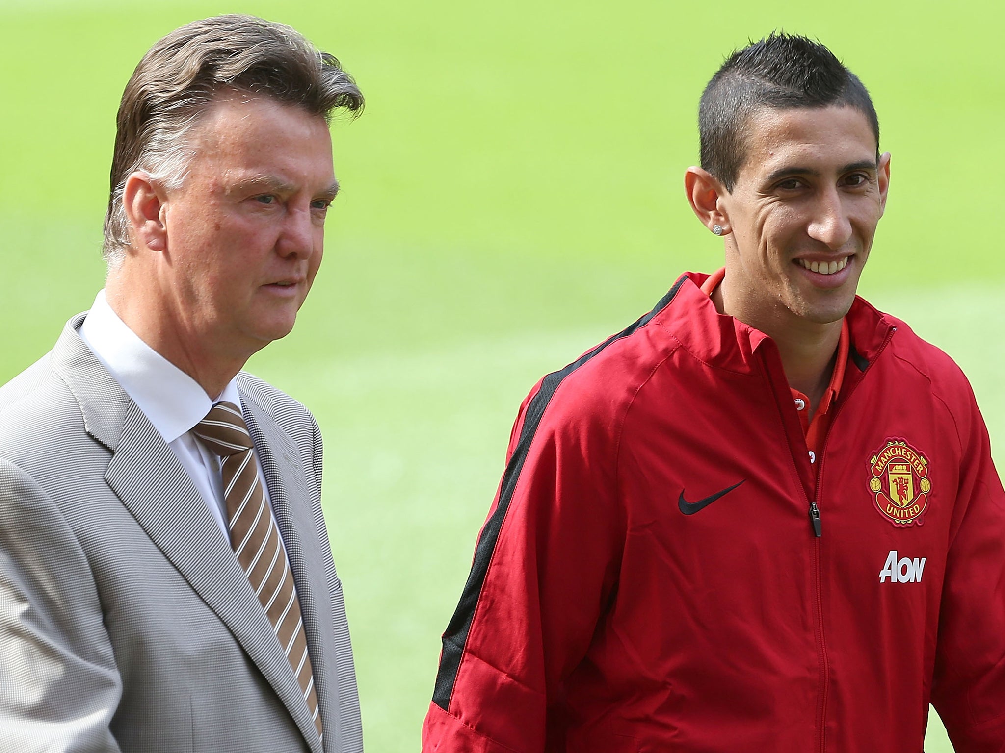 Angel Di Maria together with Louis van Gaal