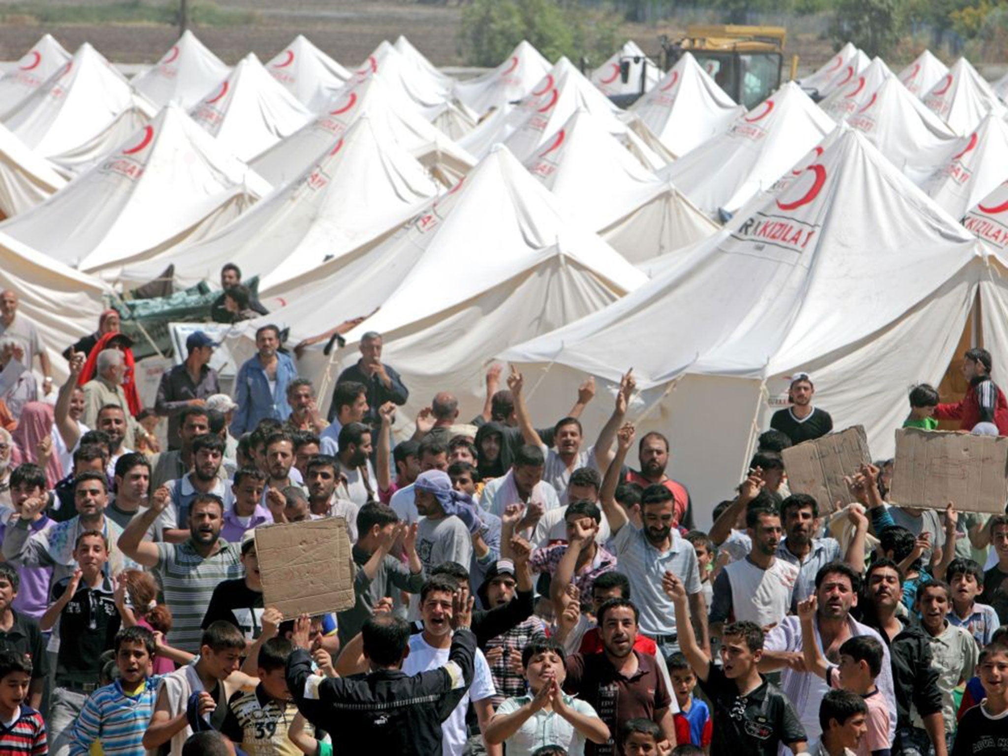 Syrian refugees in a Red Crescent camp in Boynuyogun village in Hatay, Turkey