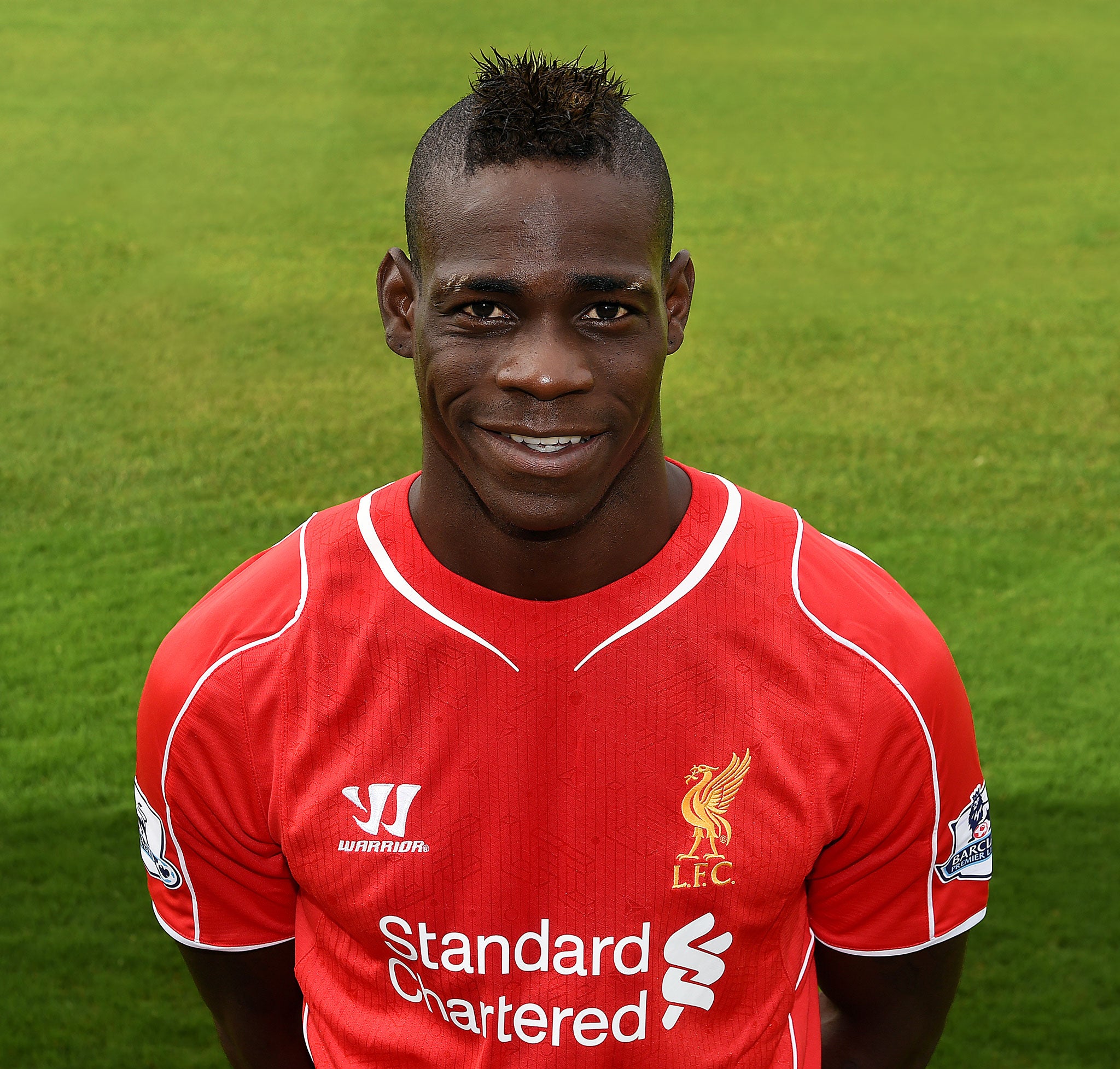 Balotelli pictured in his Liverpool shirt for the first time