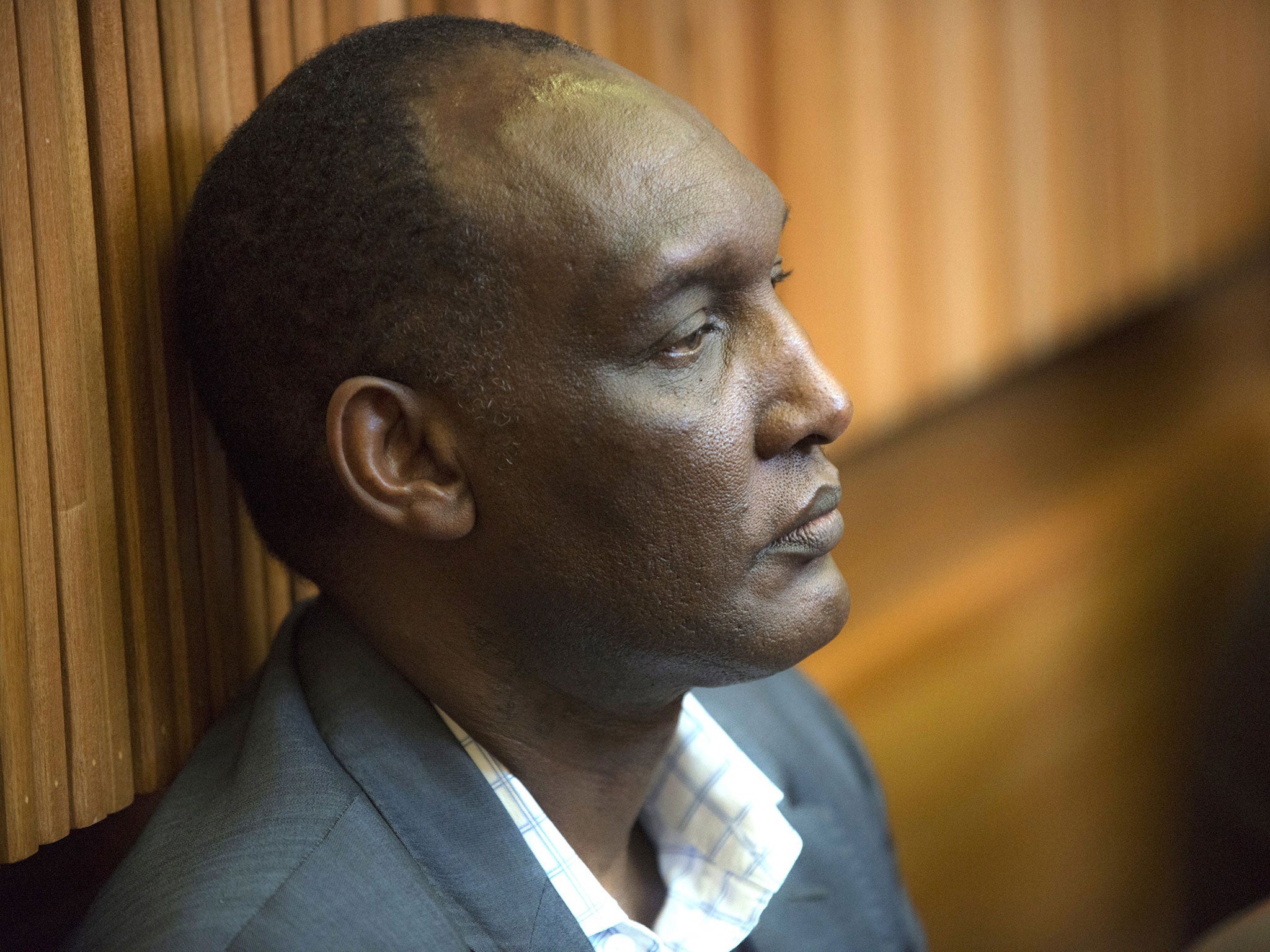 General Kayumba Nyamwasa attends the trial of six men accused of his attempted assassination