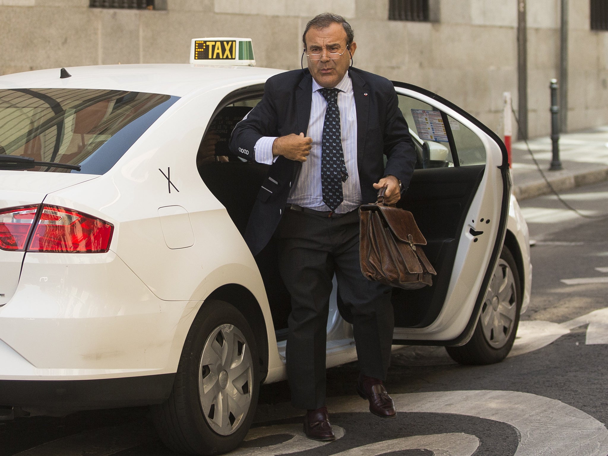 Ashya King parents's lawyer, Juan Isidro Fernandez Diaz, arrives at the National court in Madrid