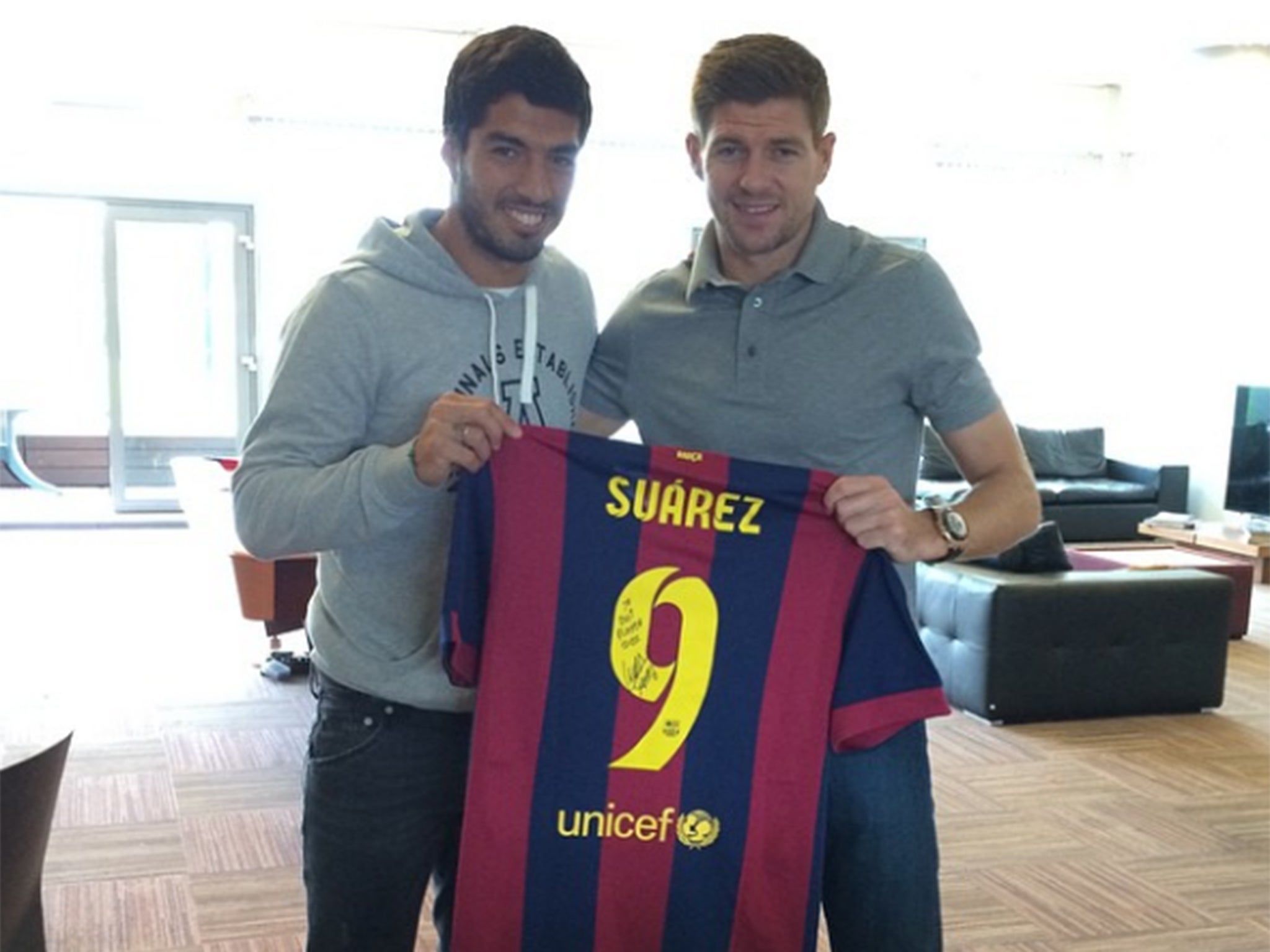 Luis Suarez together with Steven Gerrard this summer