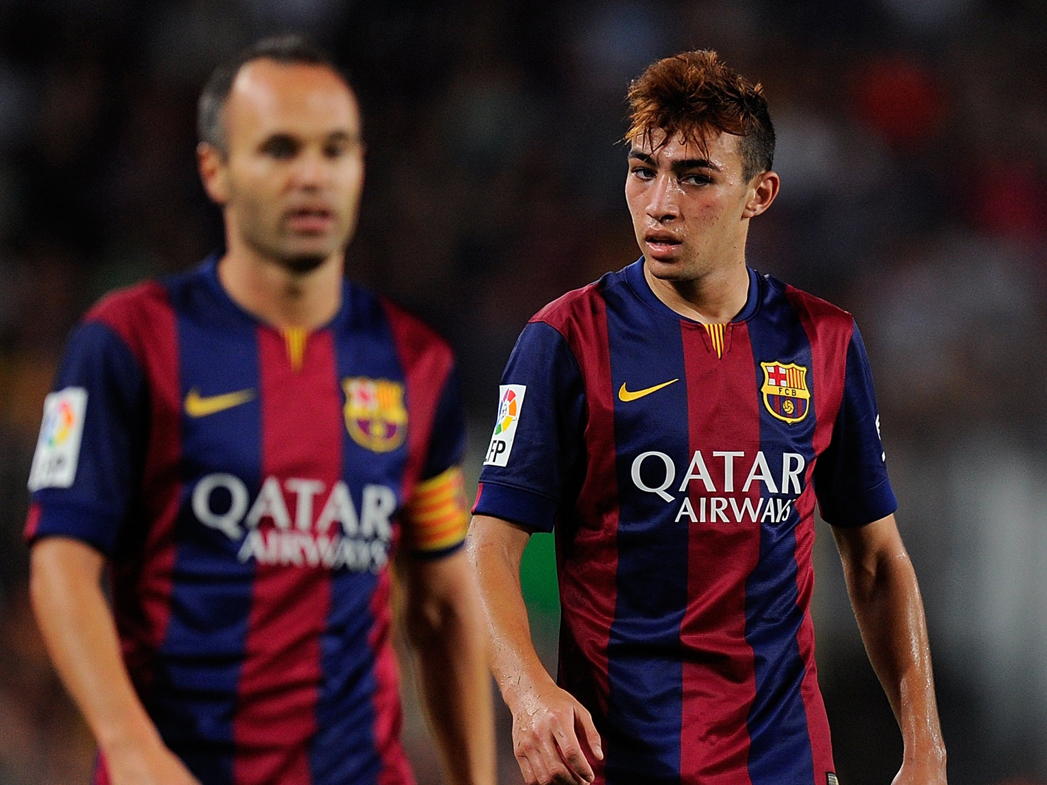 Munir El Haddadi of FC Barcelona looks on beside Andres Iniesta during the La Liga match between FC Barcelona and Elche FC