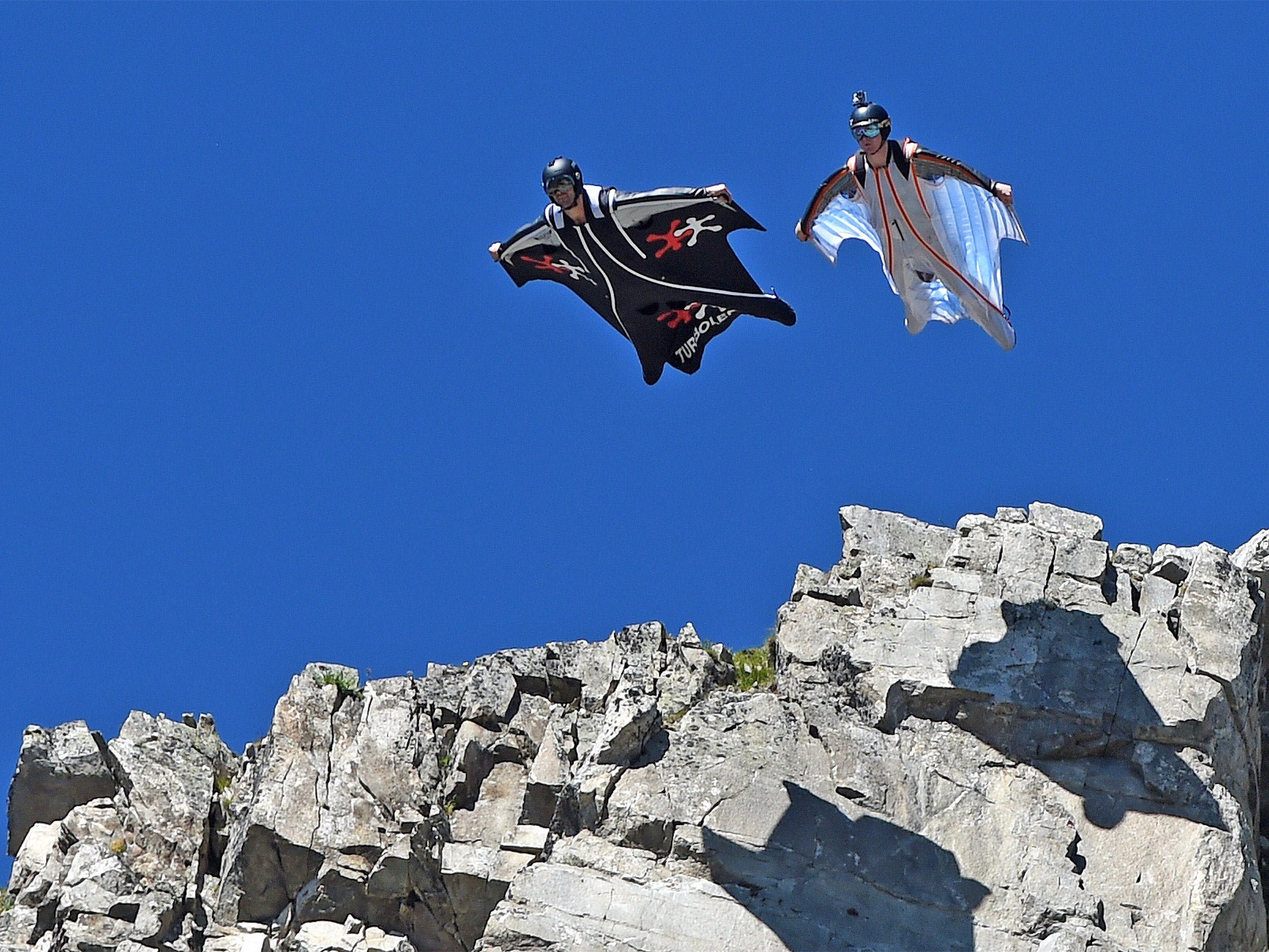 Two men jump from the top of the Brevent mountain to fly in wingsuit over the French ski resort of Chamonix, earlier this year