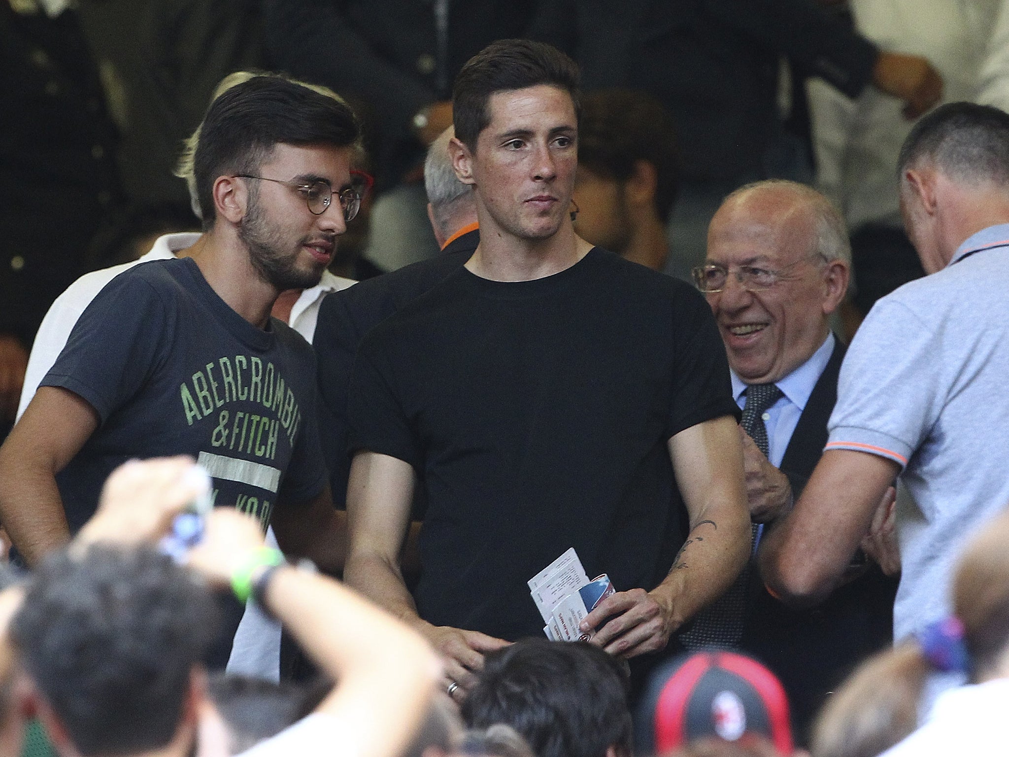 Fernando Torres watches AC Milan from the stands