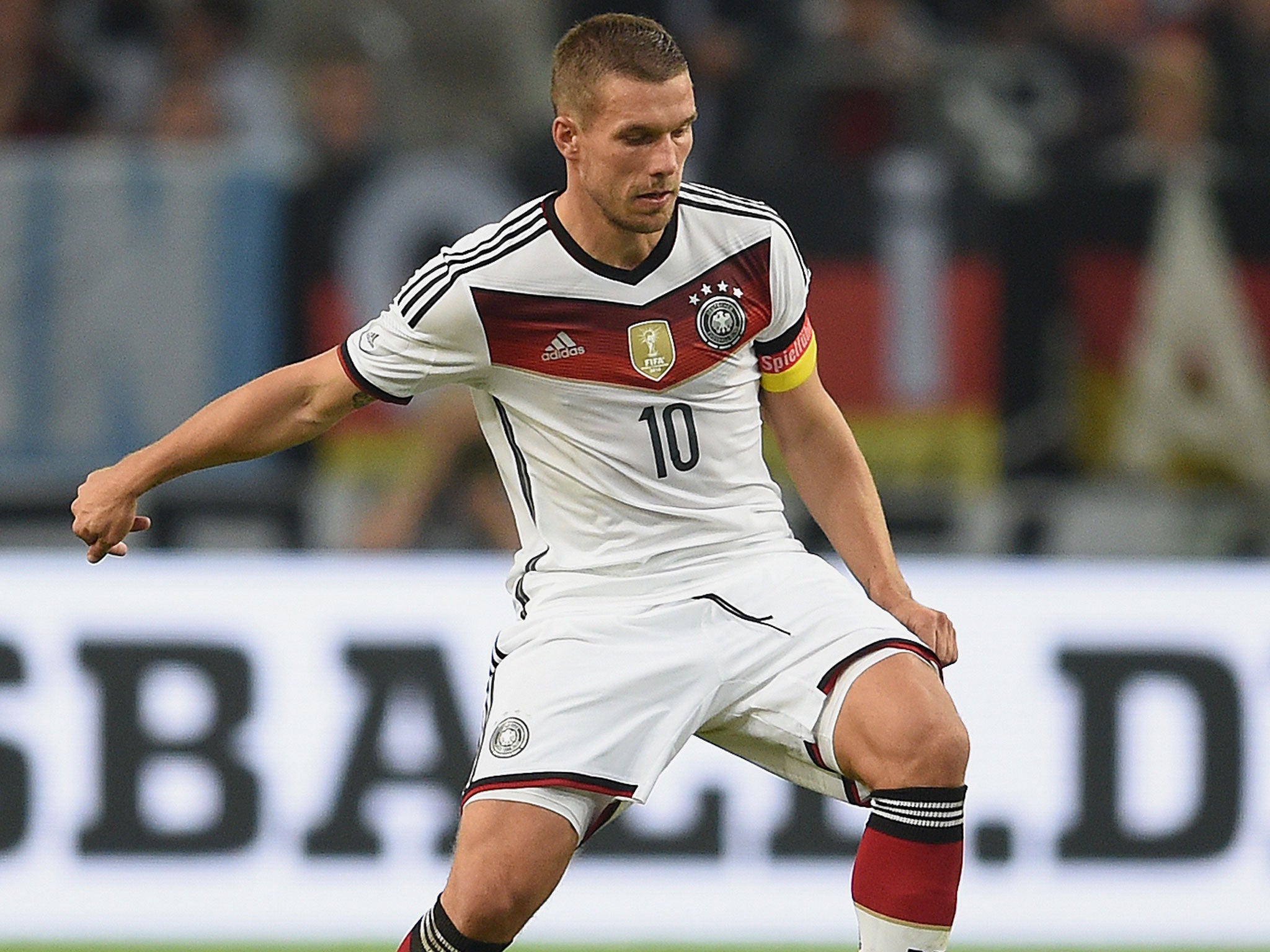 Lukas Podolski in action for Germany against Argentina last night