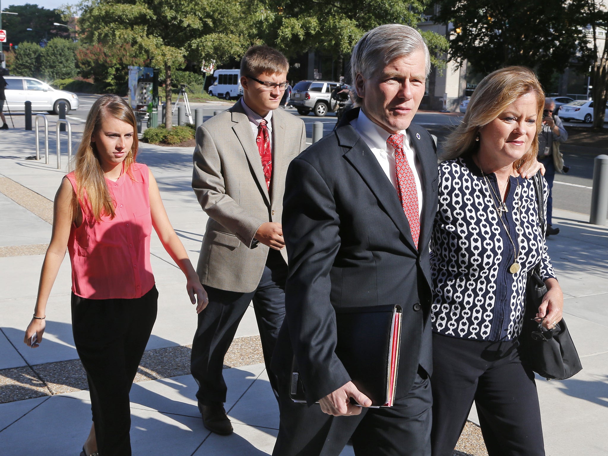 Former Virginia Gov. Bob McDonnell (third left)