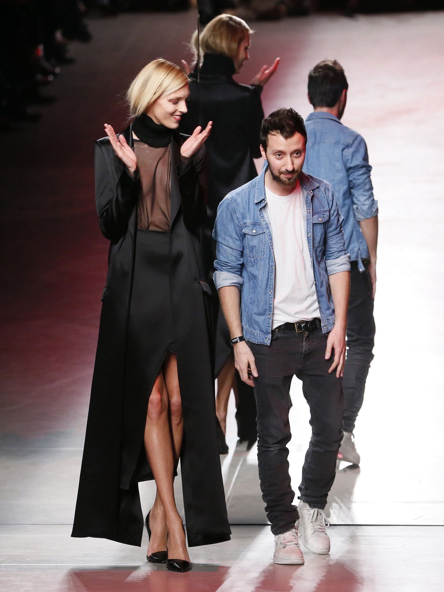 Anthony Vaccarello with model at the end of his show