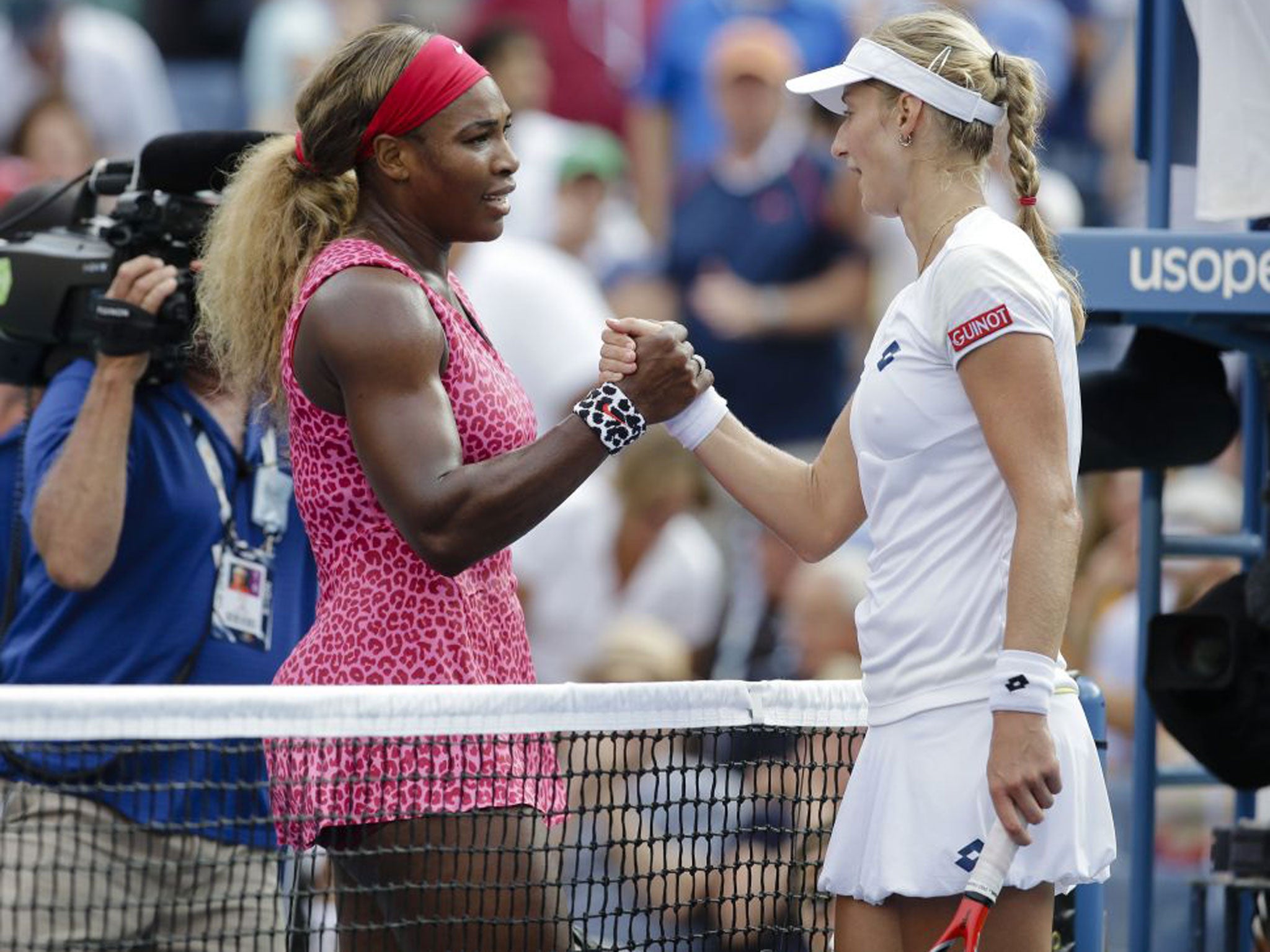 Serena Williams (left) greets Ekaterina Makarova, of Russia after winning her semifinal match