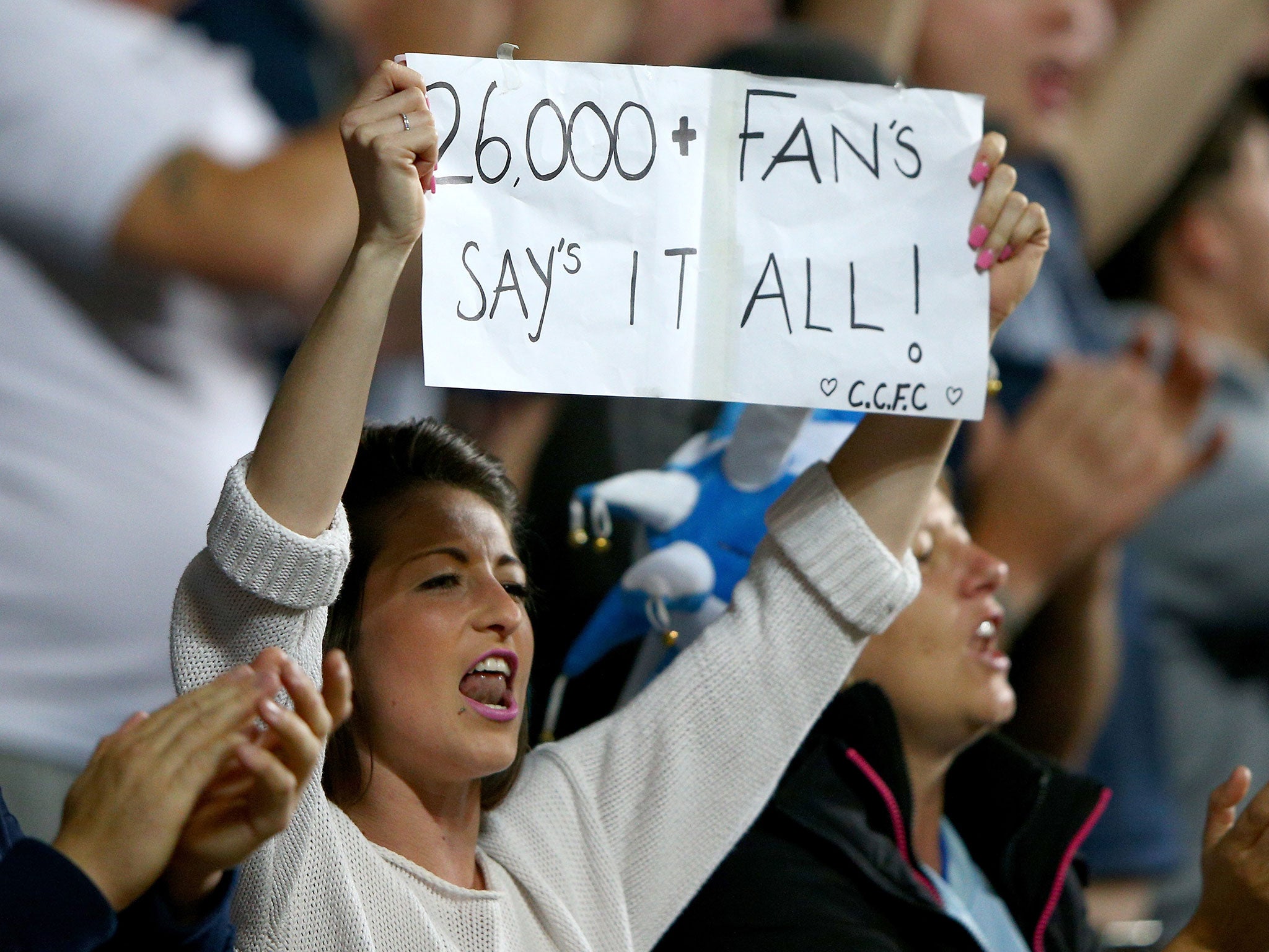 Coventry City fans celebrate the Sky Blues' return to the Ricoh Arena