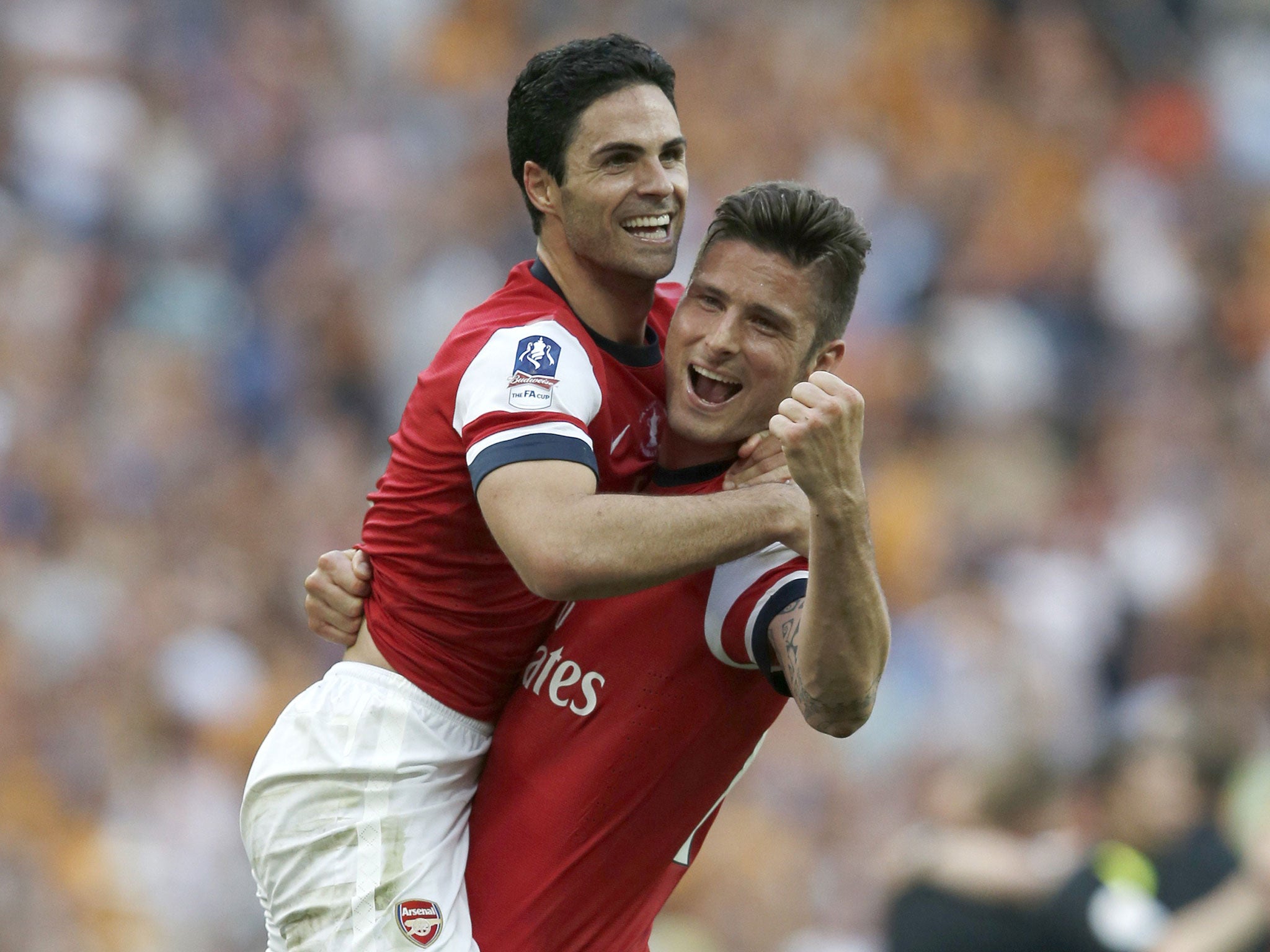 Mikel Arteta and Olivier Giroud