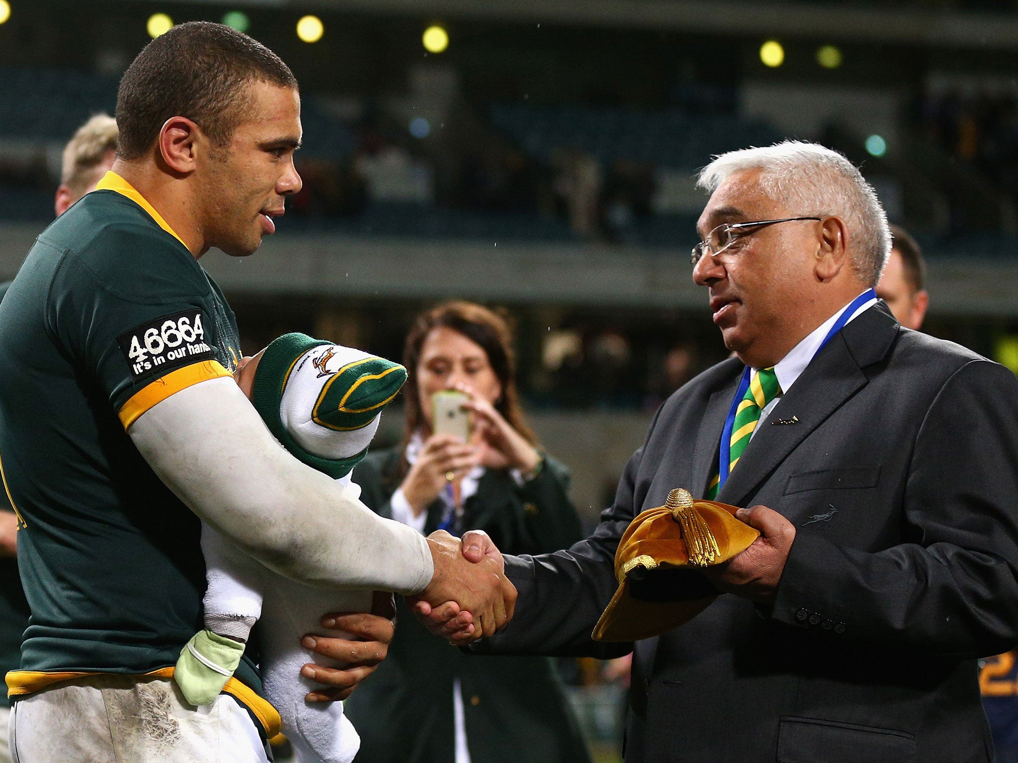 Bryan Habana is presented with a cap after playing his 100th Test