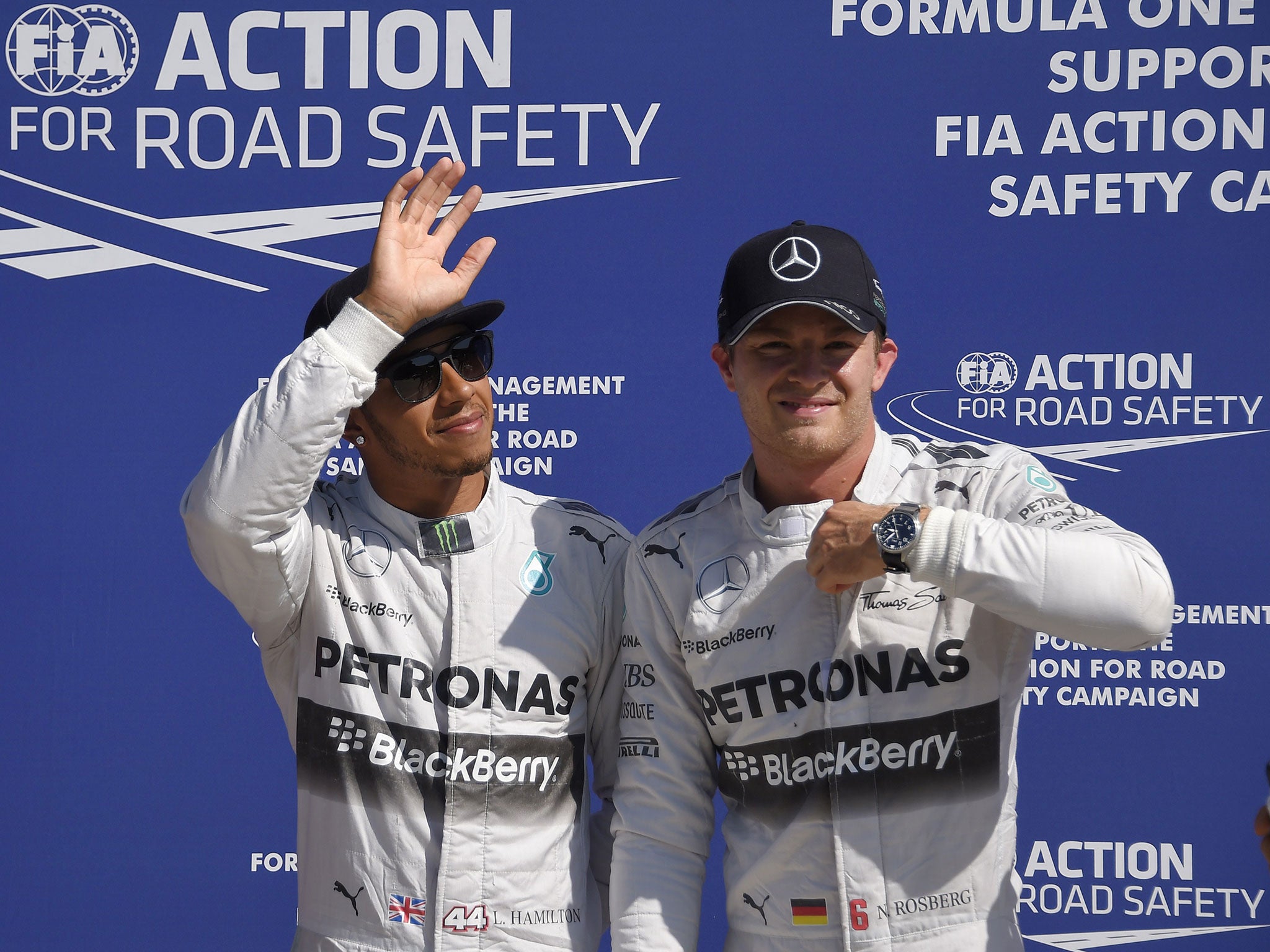 Hamilton and Rosberg stand alongside each other after locking out the front-row