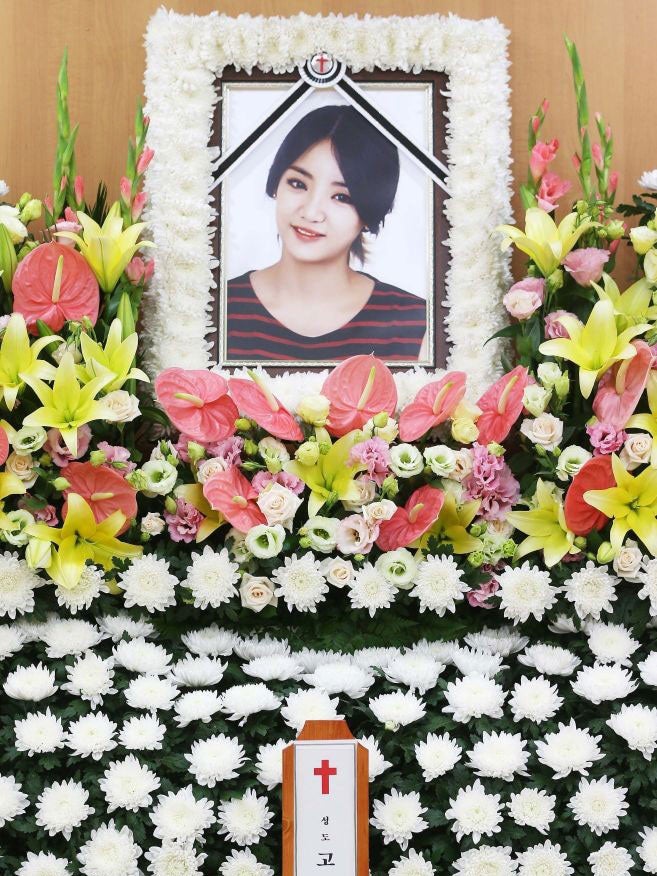 A portrait of South Korean singer EunB at the funeral parlour of the Korea University Hospital in Seoul