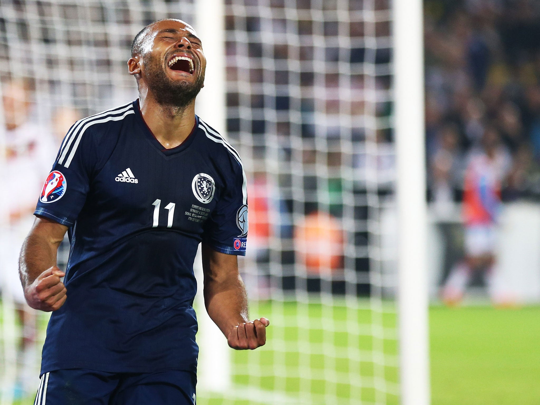 Ikechi Anya celebrates after equalising against Germany