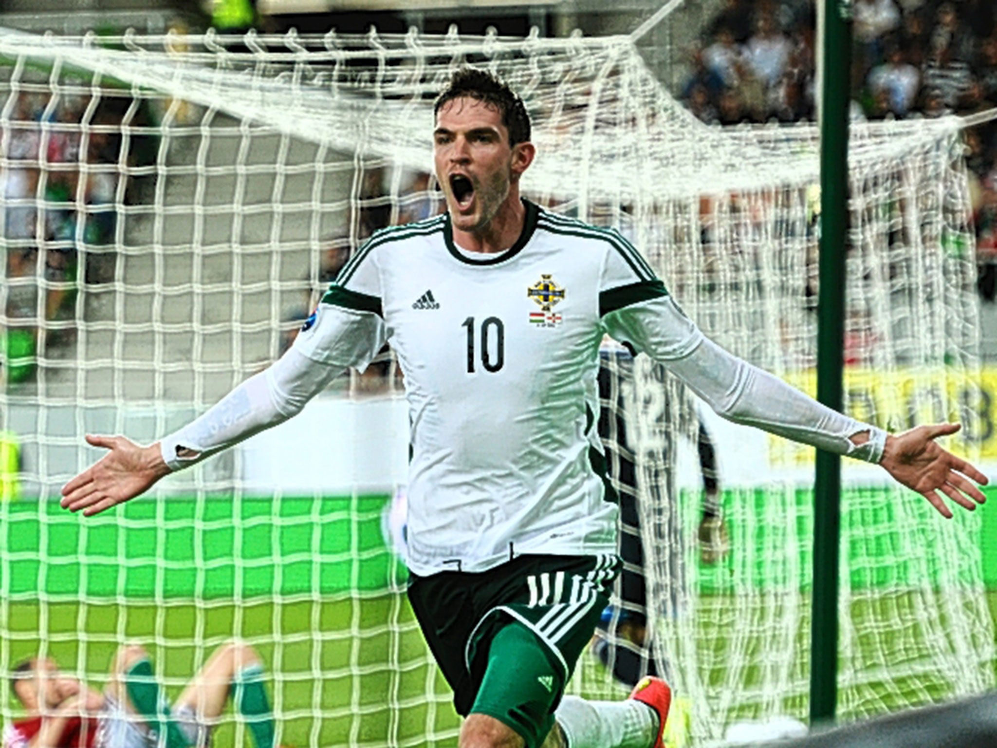 Kyle Lafferty celebrates his winner for Northern Ireland