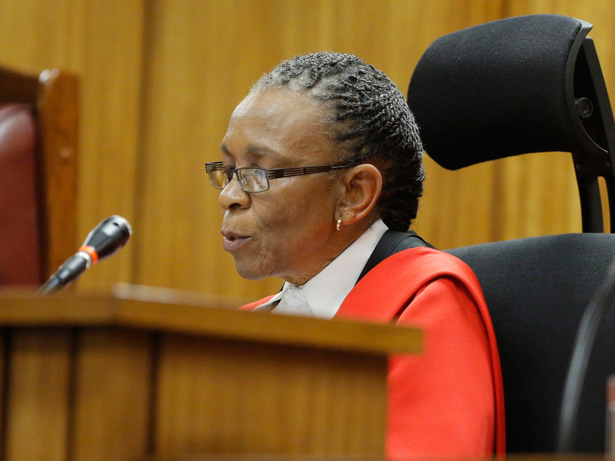 Judge Thokozile Masipa reads her verdict during the Oscar Pistorius trial in Pretoria (EPA)