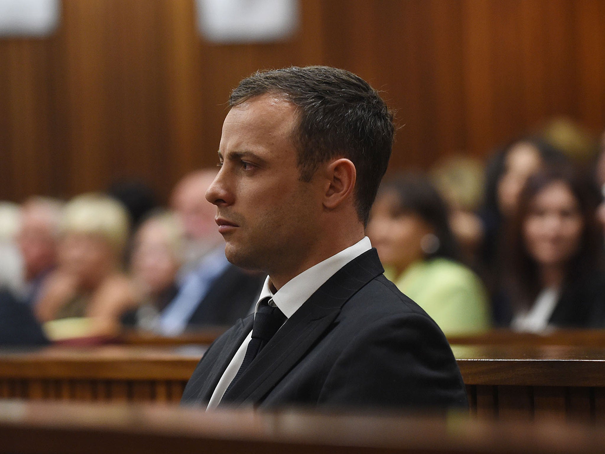 Oscar Pistorius sits in the Pretoria High Court on September 11, 2014, in Pretoria, South Africa.