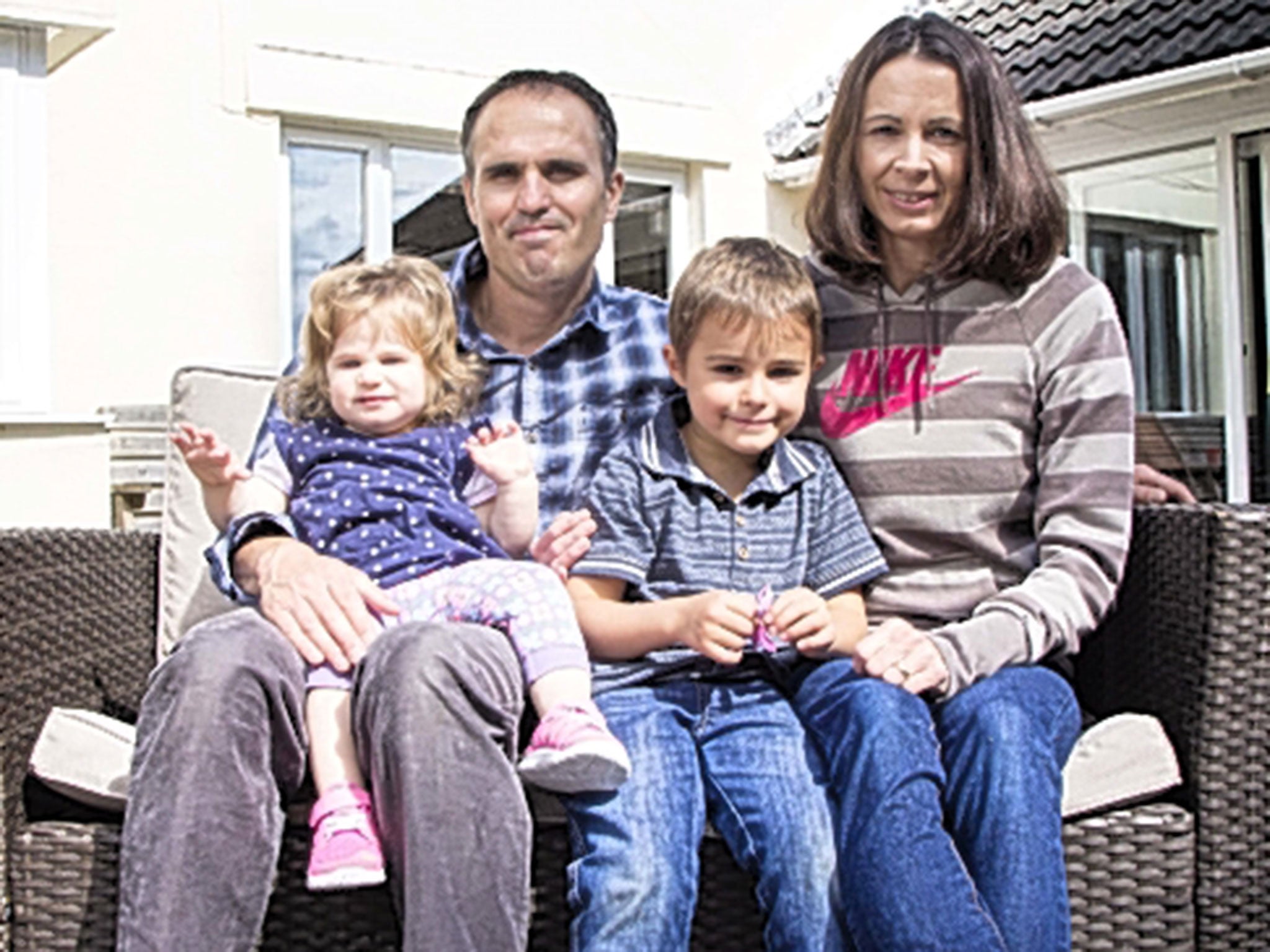 Jo Pavey at home in Devon with husband Gavin and children Jacob and Emily