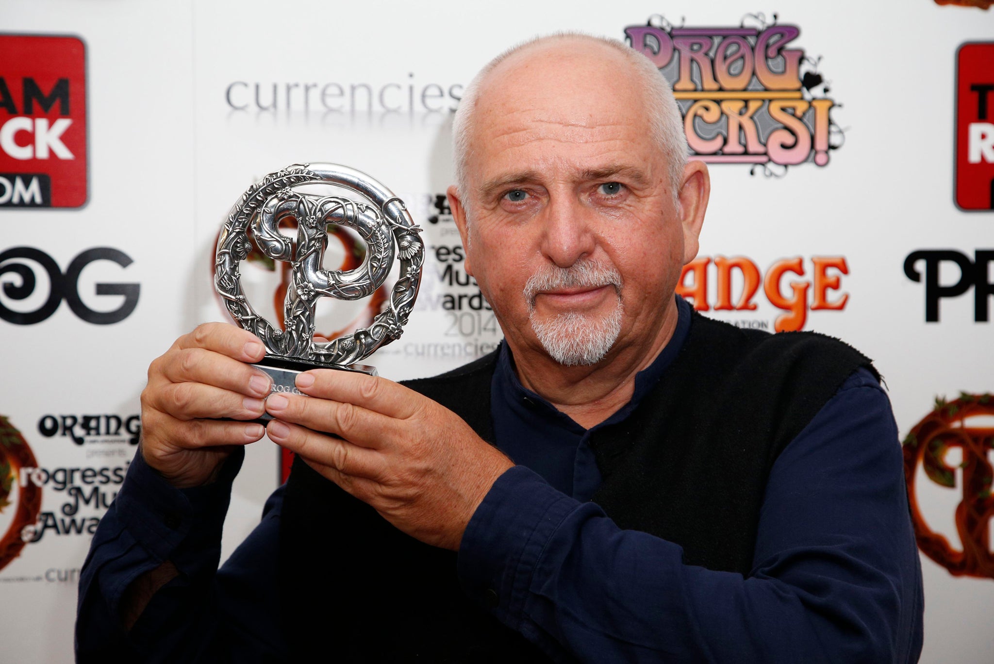 Peter Gabriel with his 'Prog God' award at the Prog Music Awards 2014