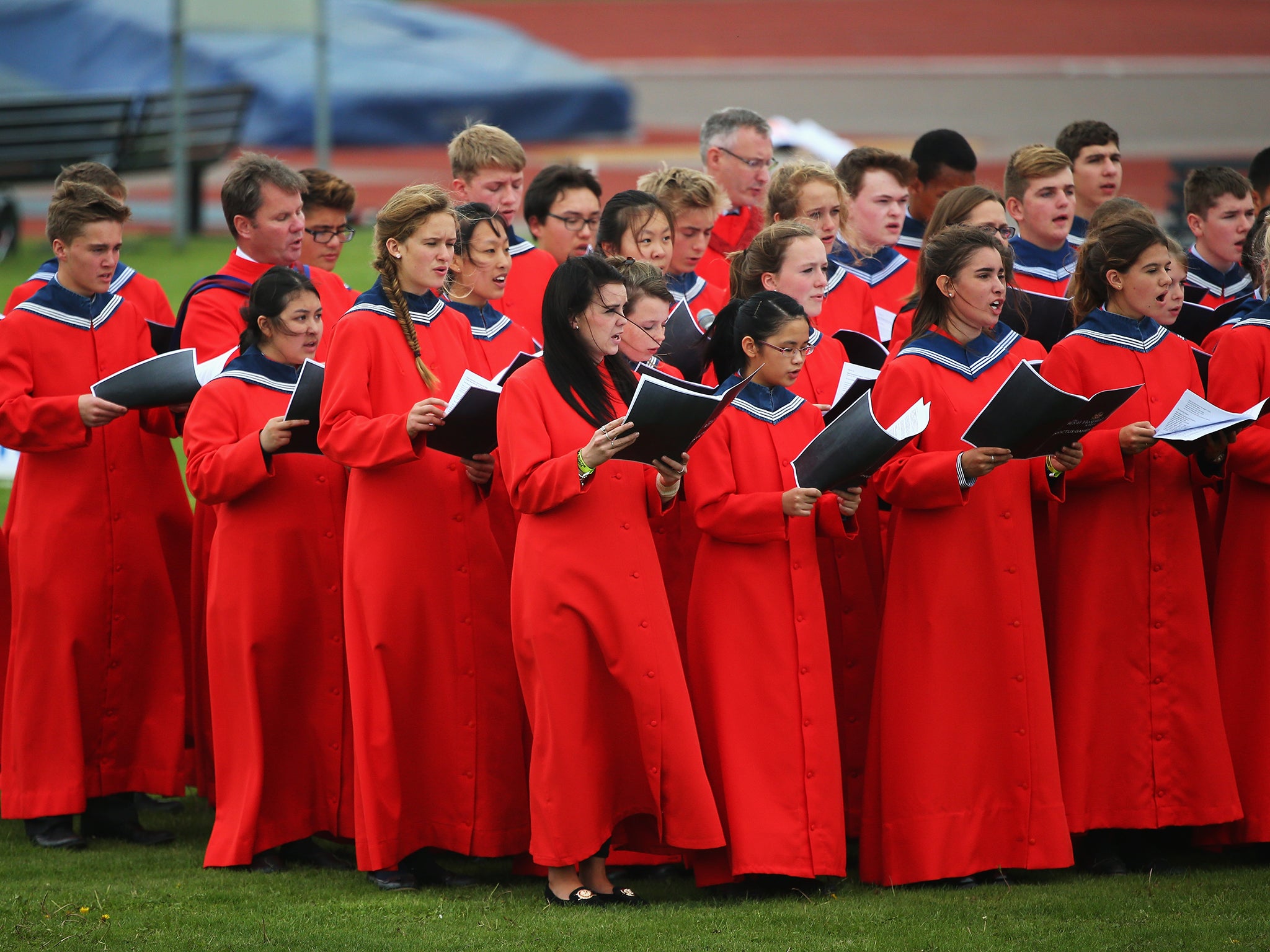 The Royal Hospital School Choir sing in the Drumhead Service during day 1 of the Invictus Games, presented by Jaguar Land Rover at Lee Valley Athletics Centre in London