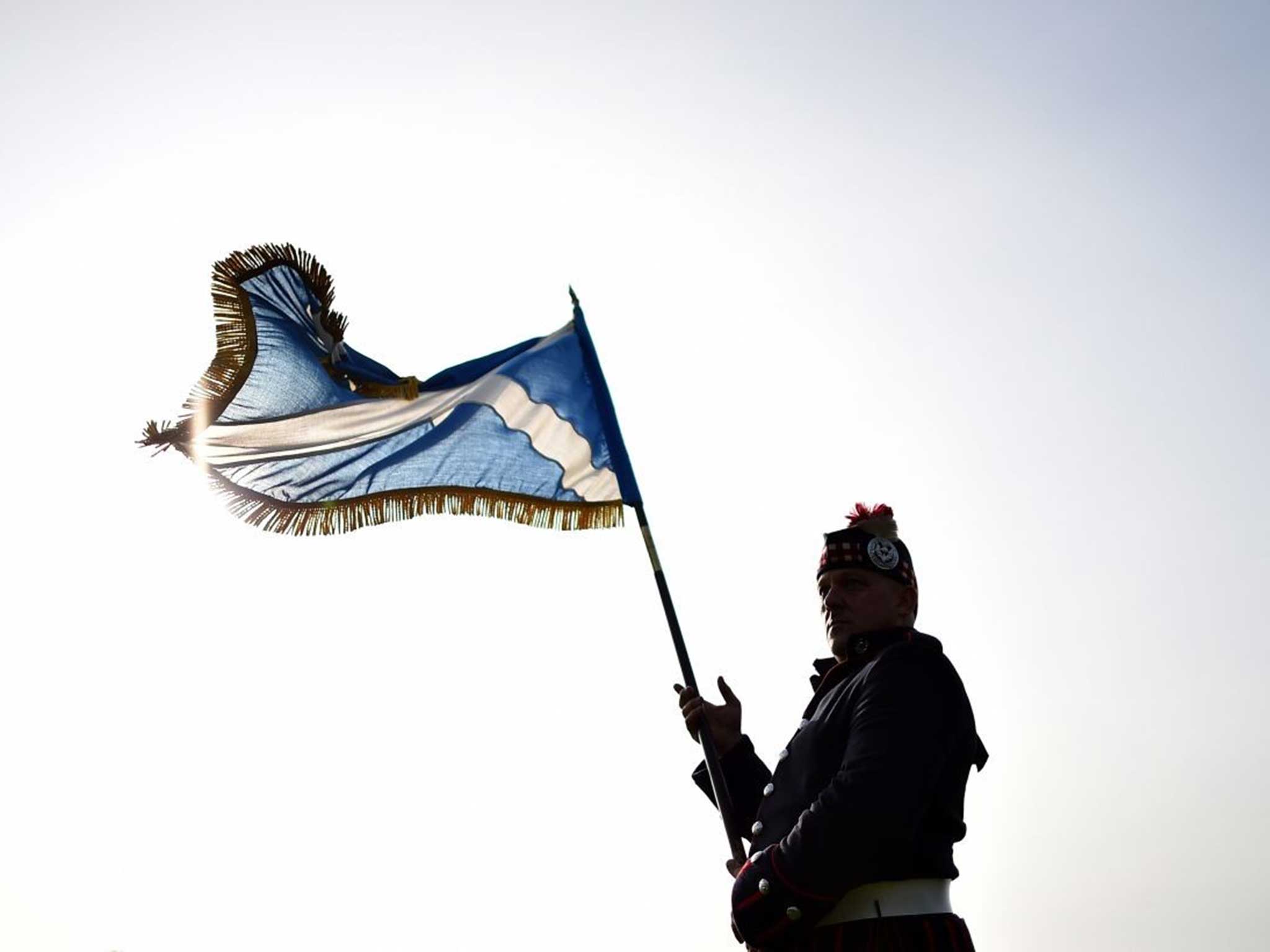 A lone Scotsman flies the Saltire