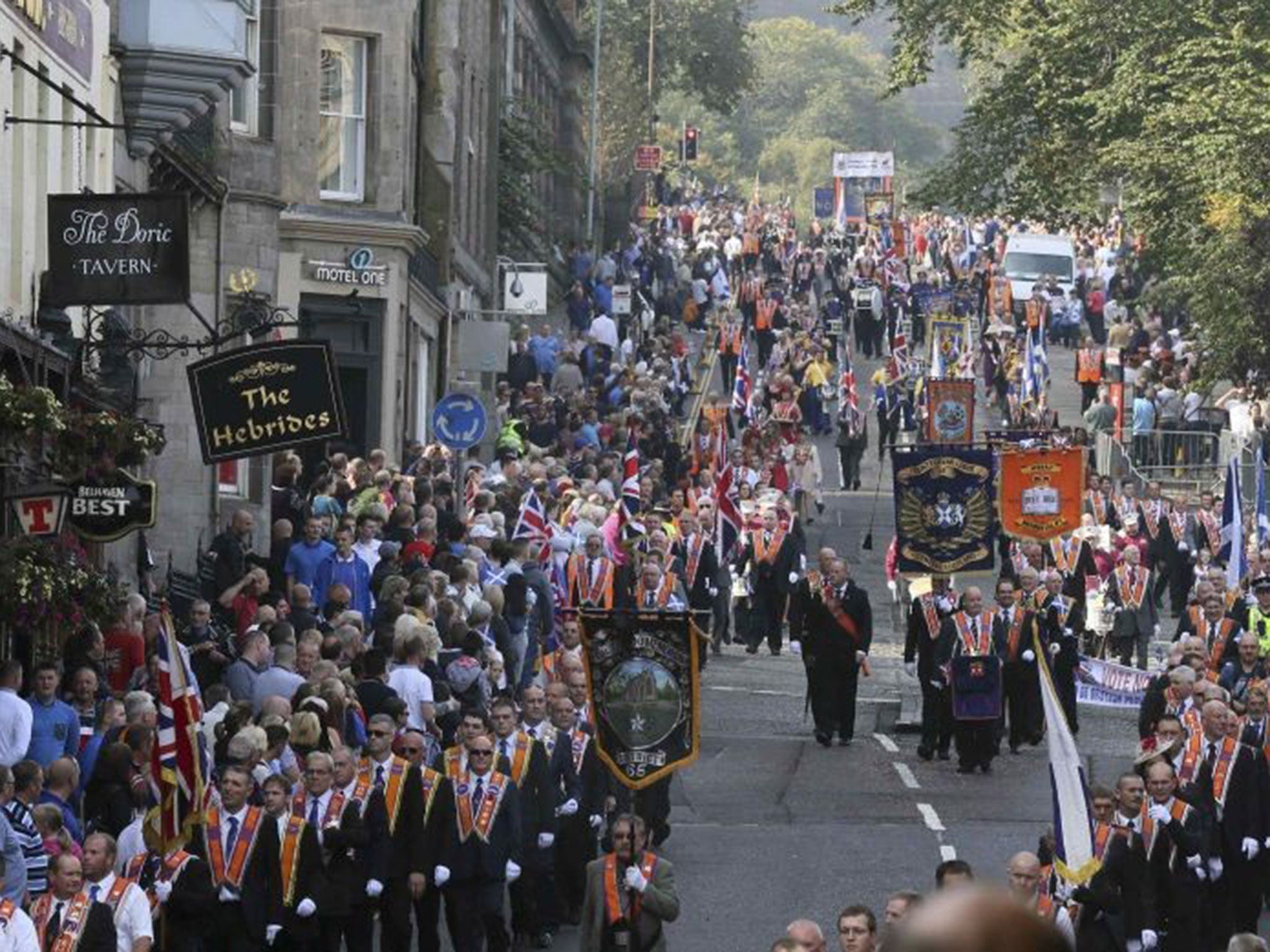 Members of the Orange Order march through Edinburgh