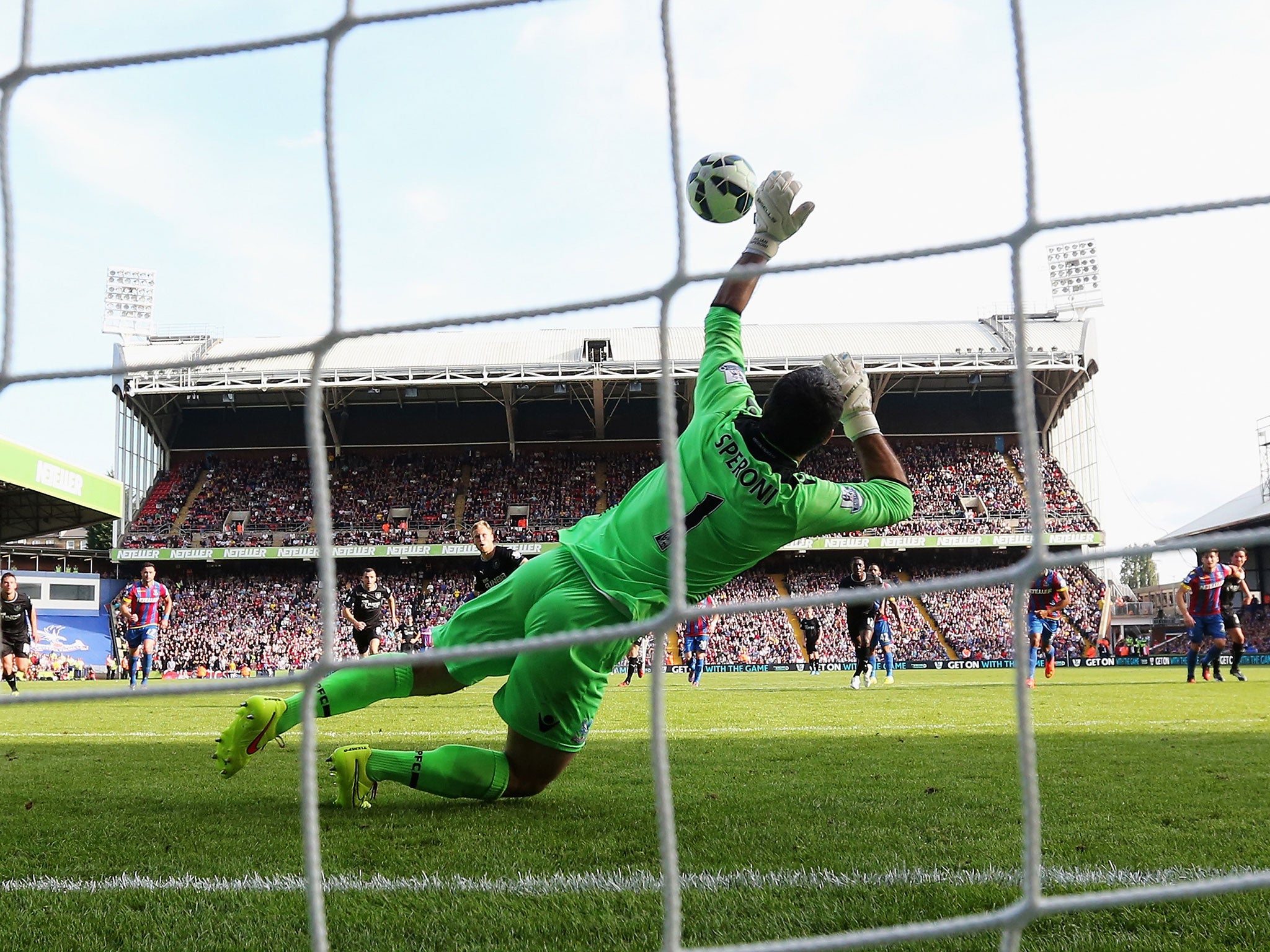 Julian Speroni saves Scott Arfield's penalty