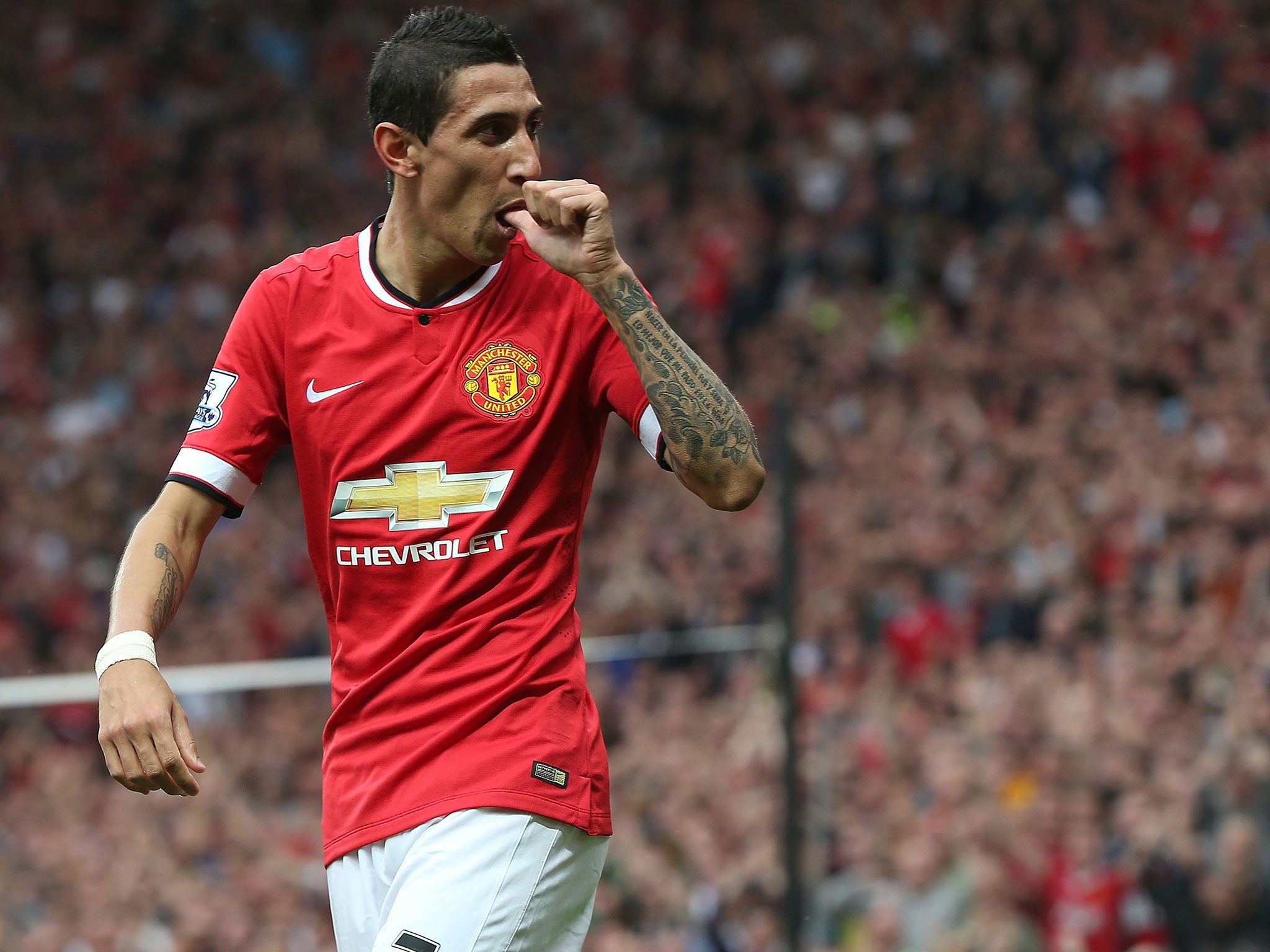 Angel Di Maria celebrates his first goal for United against QPR