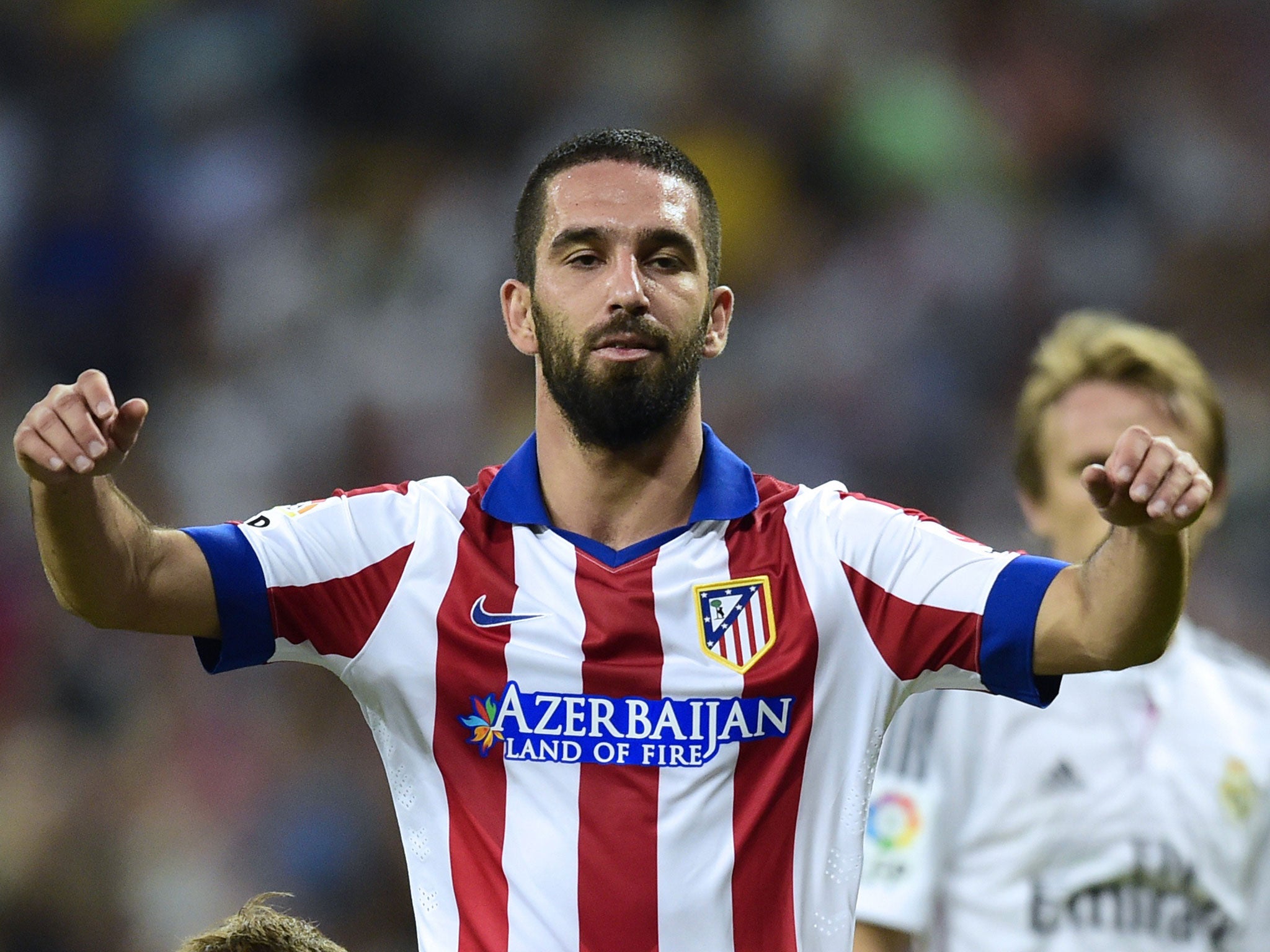 Arda Turan celebrates his goal for Ateltico Madrid