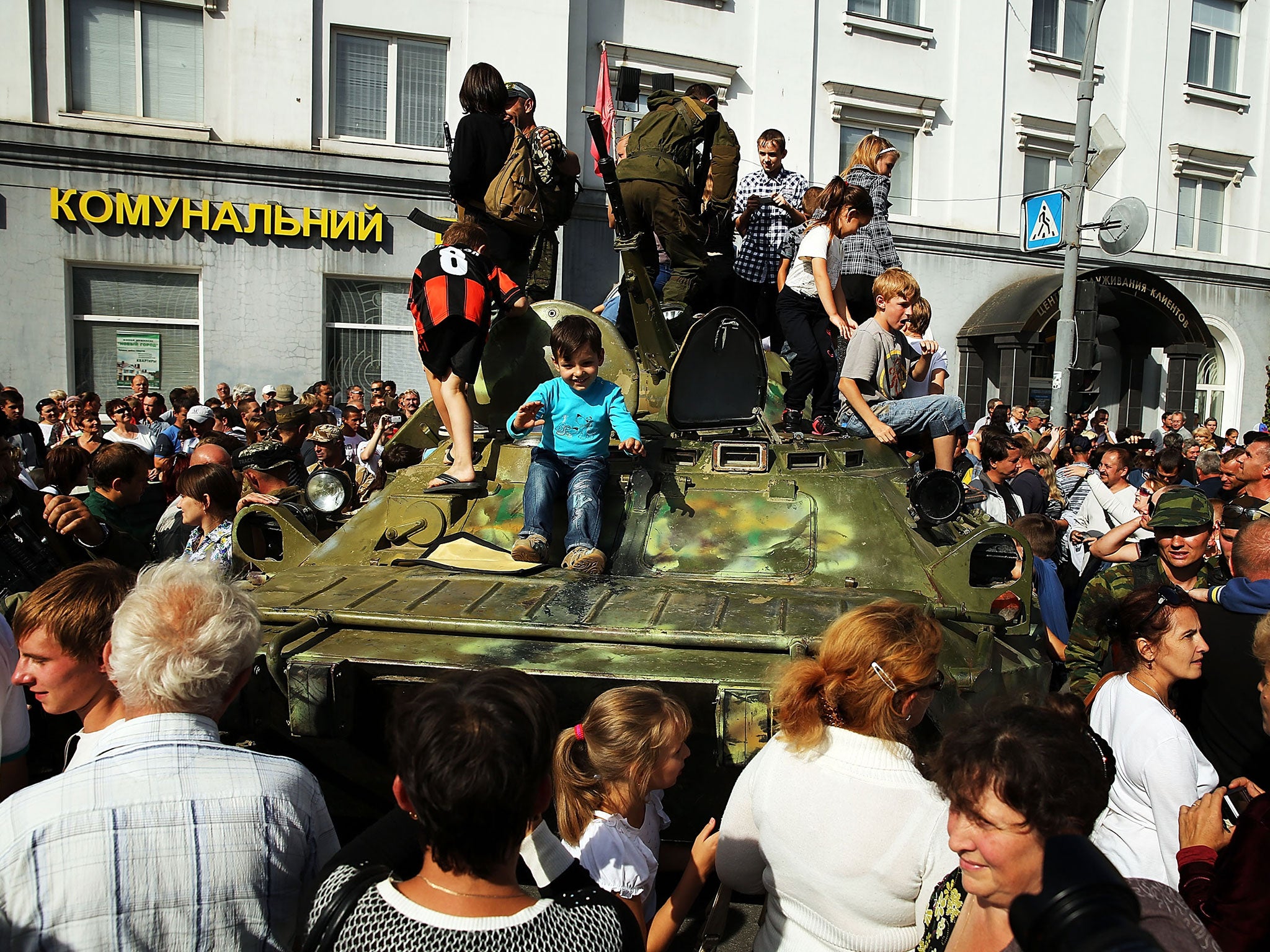 Luhansk residents thank pro-Russian separatists during a rare day of celebration