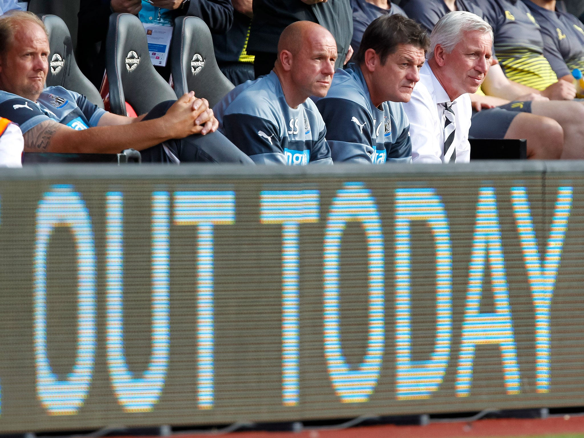 An advertising board at St Mary’s spells out a prophetic message for Newcastle United coaches Steve Stone, John Carver and Alan Pardew