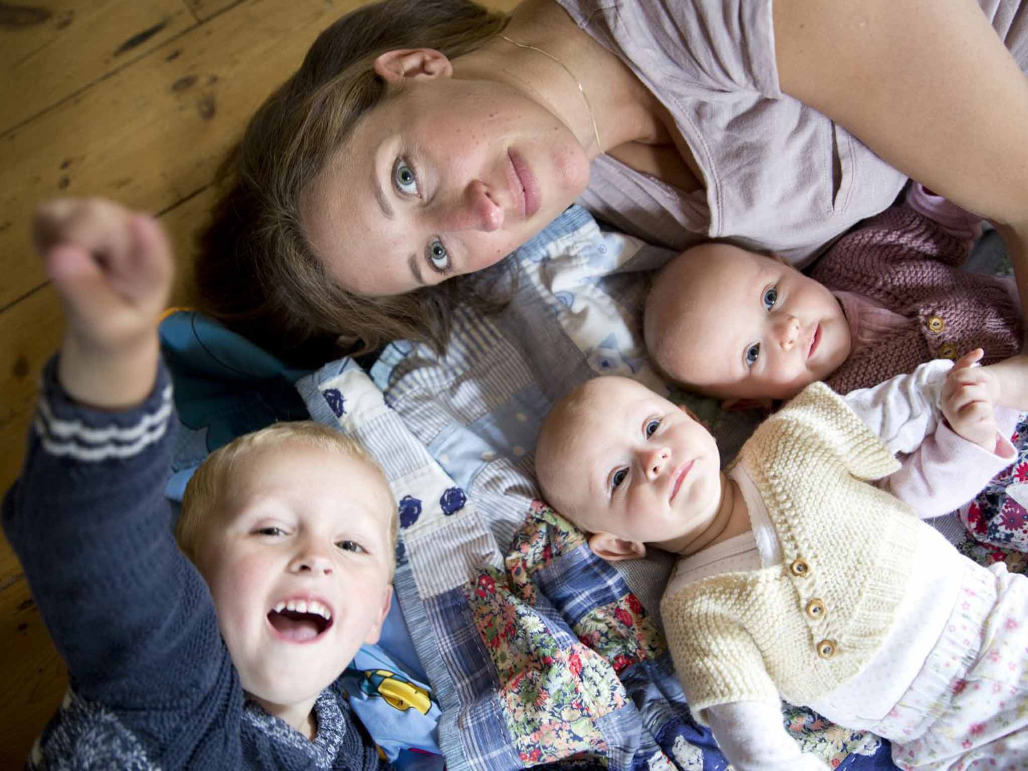 Katy Charlton with son Oscar, two-and-a half years, who suffers from cystic fibrosis, and twin daughters Chloe and Eleanor, three months