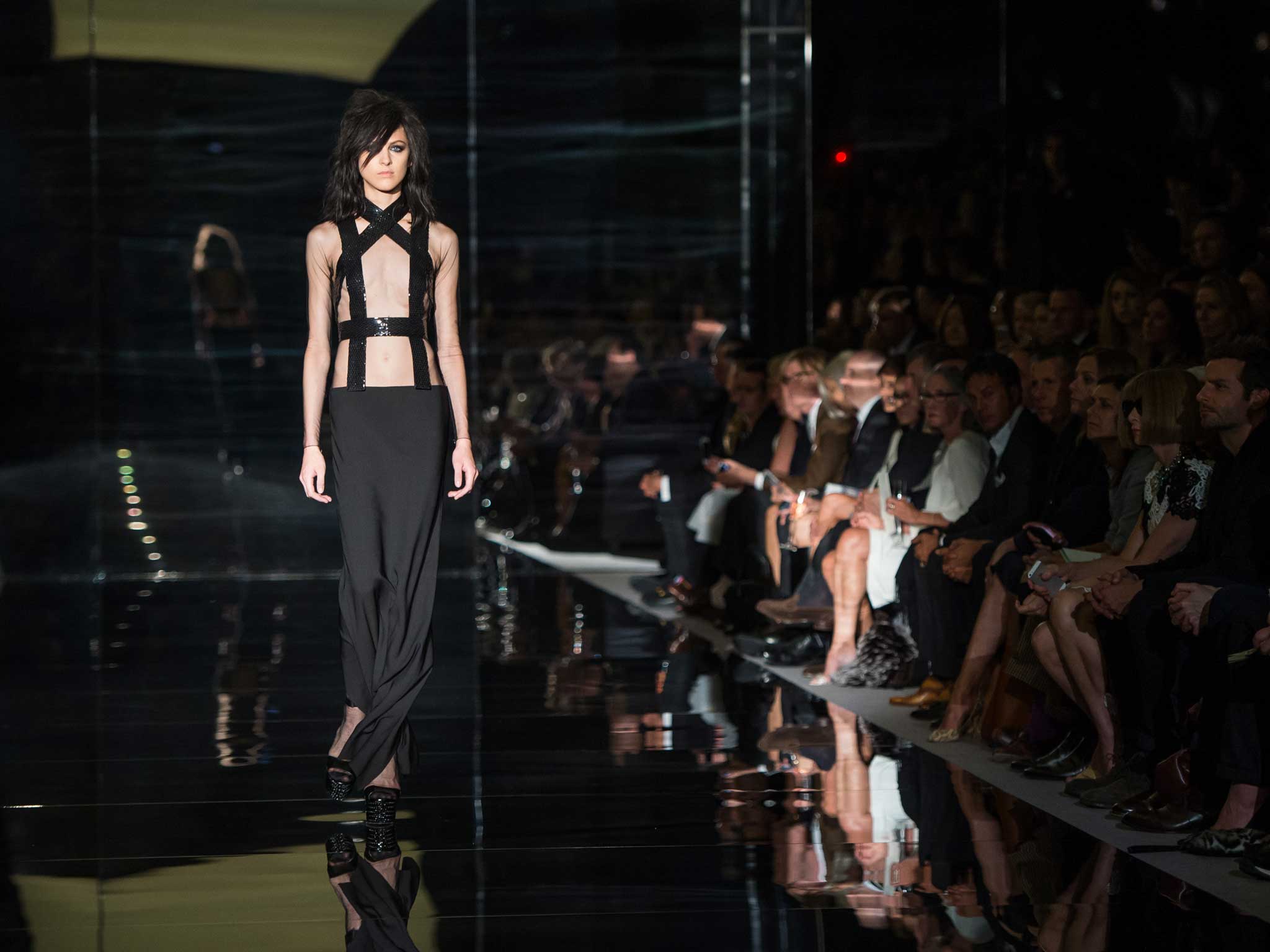 Models walk the runway at the Tom Ford show during London Fashion Week spring/summer 2015