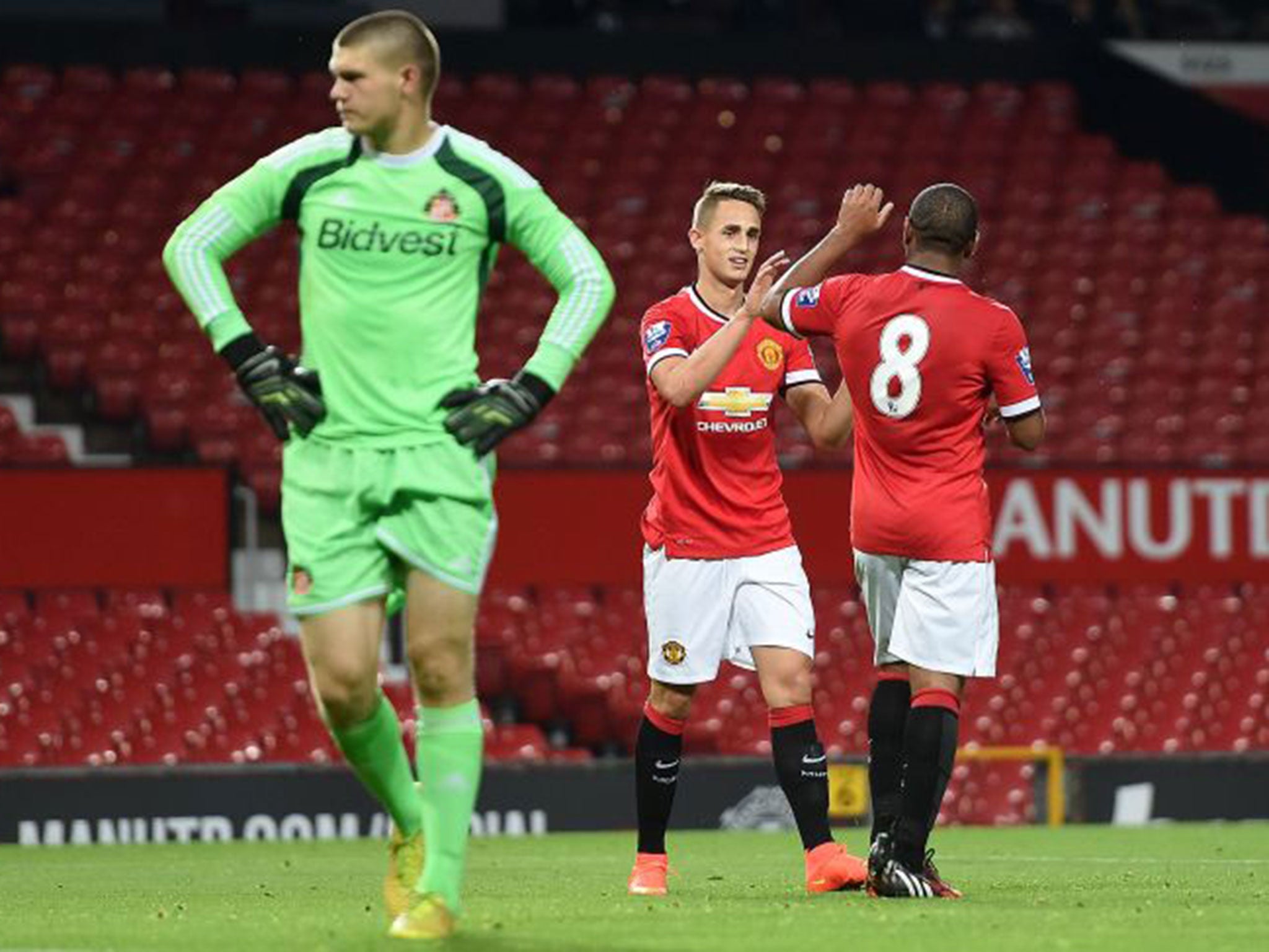 Januzaj celebrates with Anderson - Luke Shaw also played in the match