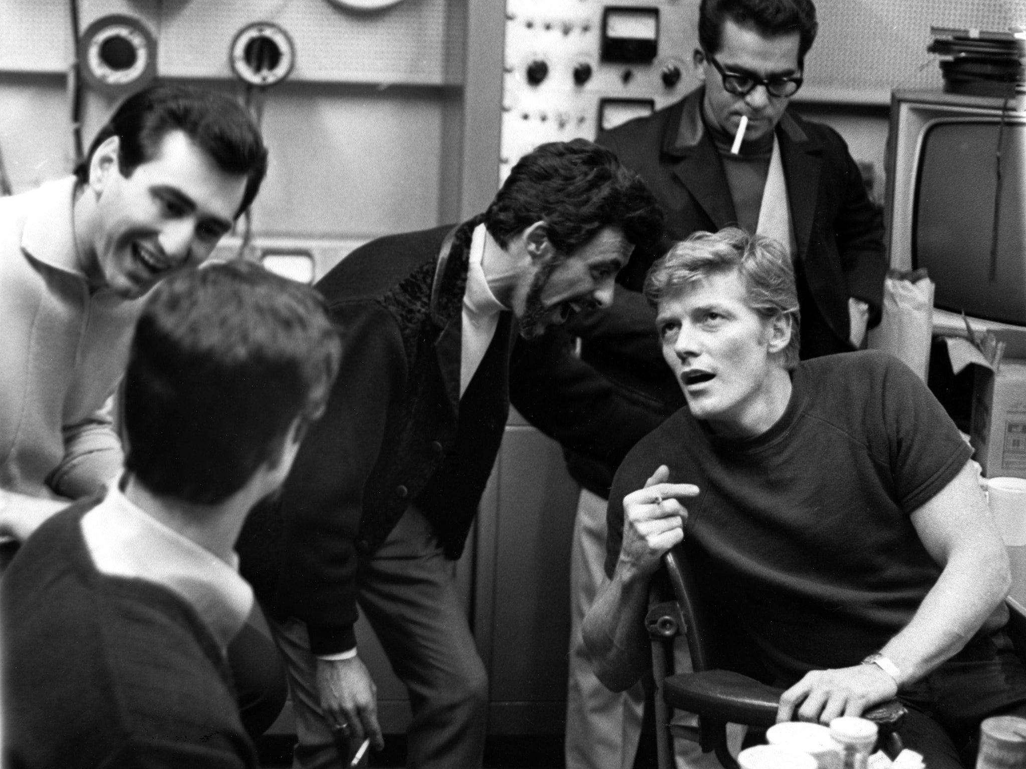 Crewe, right, sitting, and the bearded Frankie Valli, during a recording session in 1967