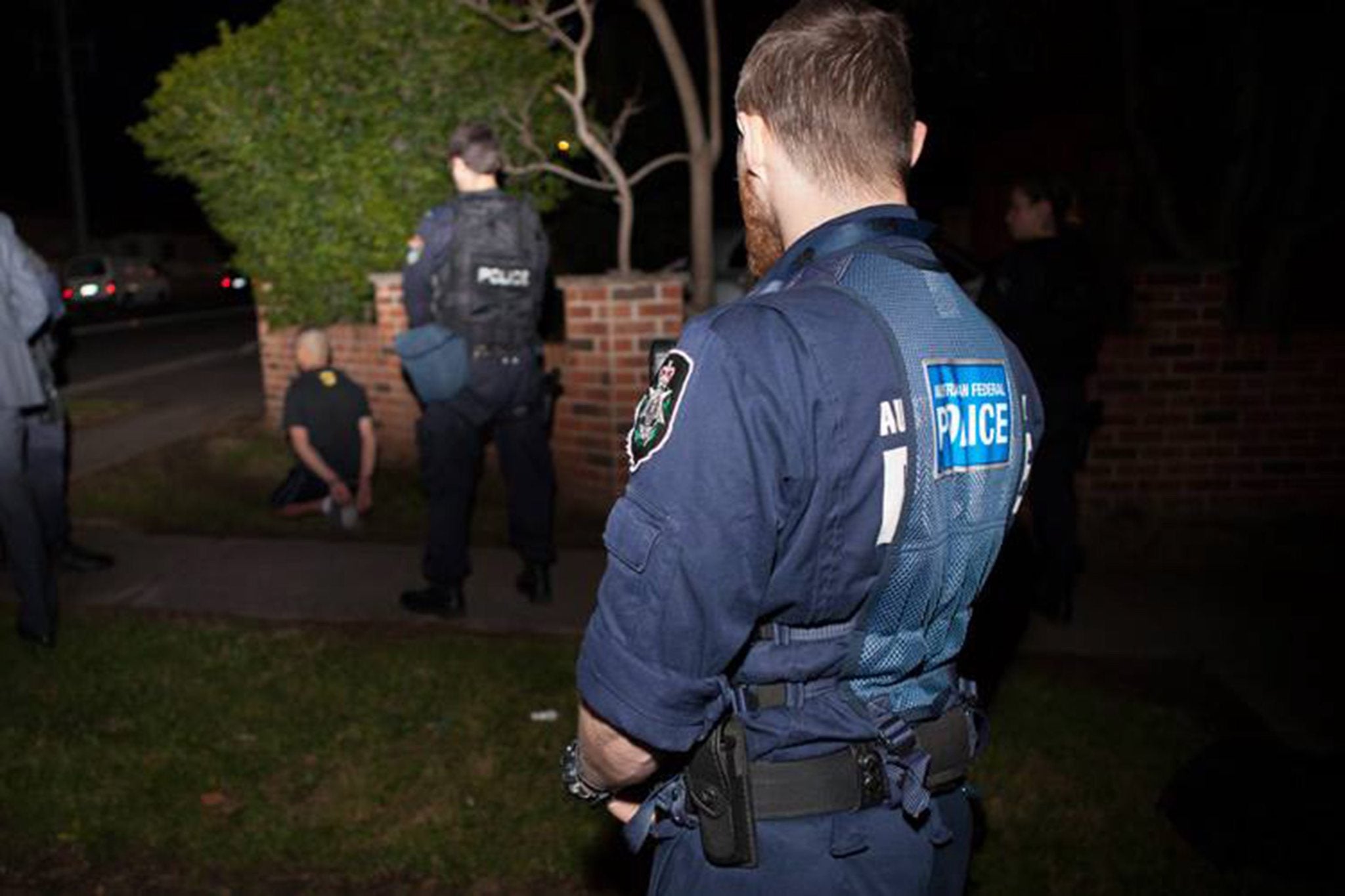 Fifteen people were detained following pre-dawn raids terror across Sydney and Brisbane in September