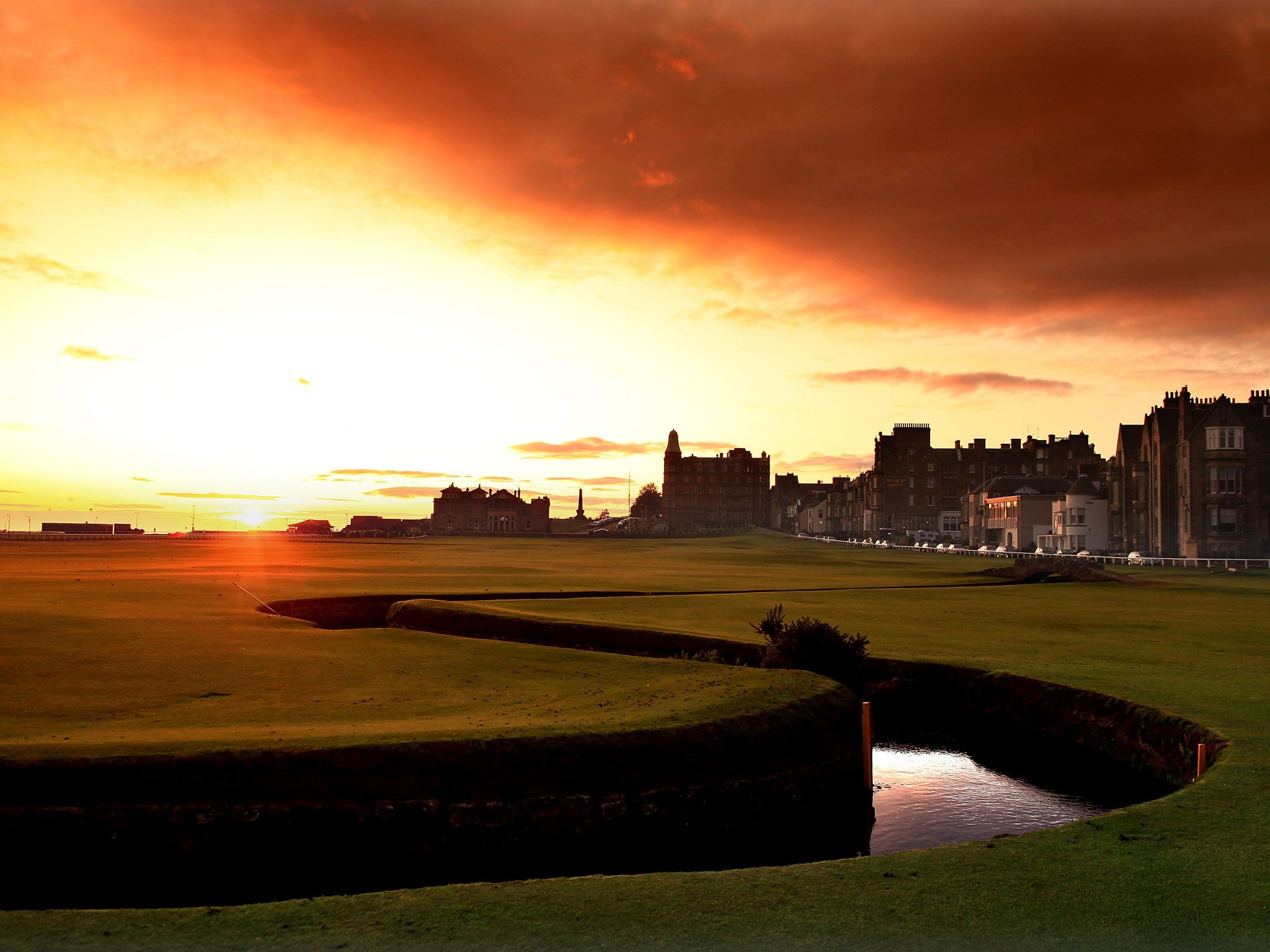 The sun rises over St Andrews golf course, but will it be a new dawn for the Royal and Ancient Golf Club?