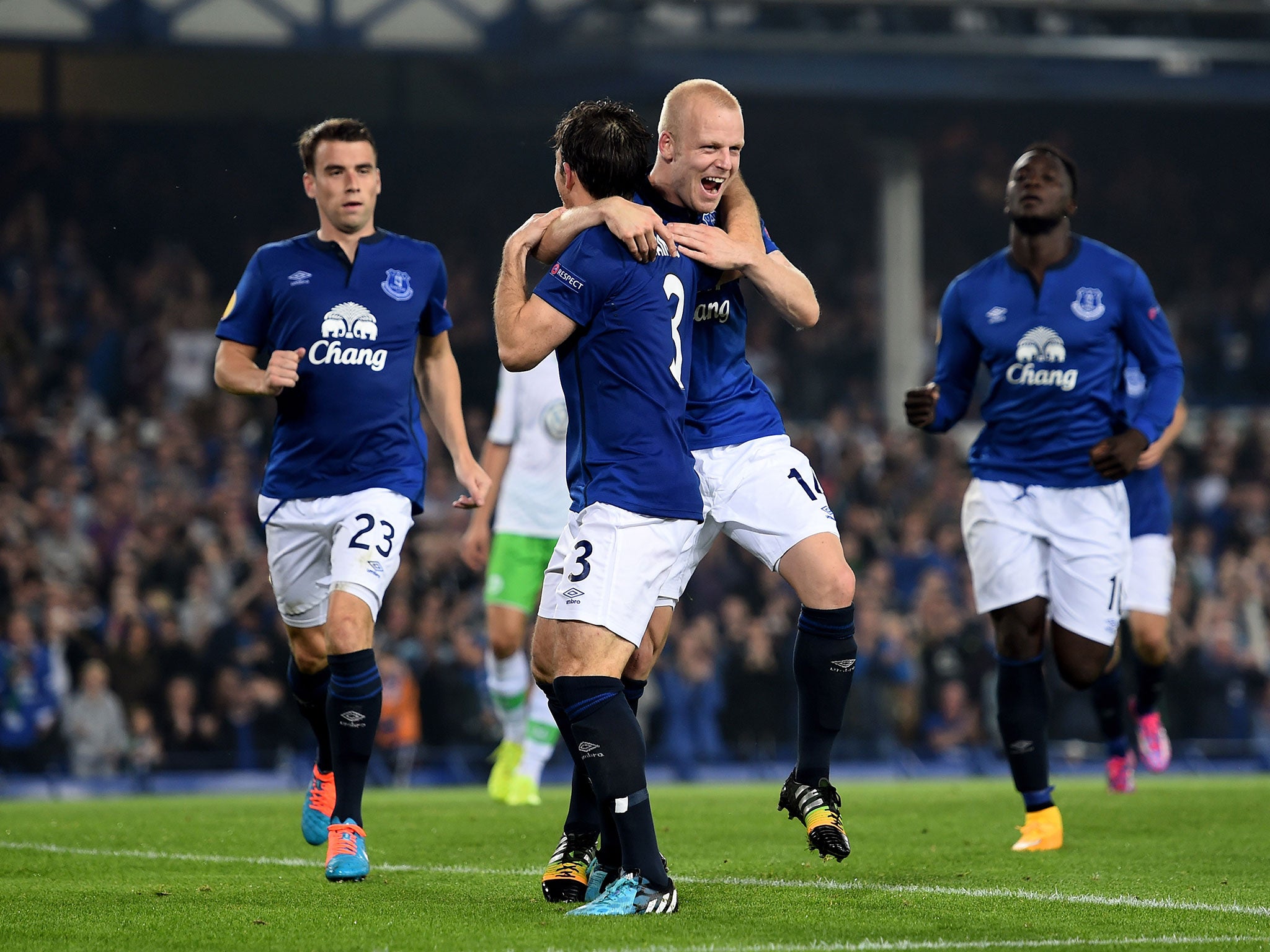 Leighton Baines (No 3) celebrates his goal with Steven Naismith