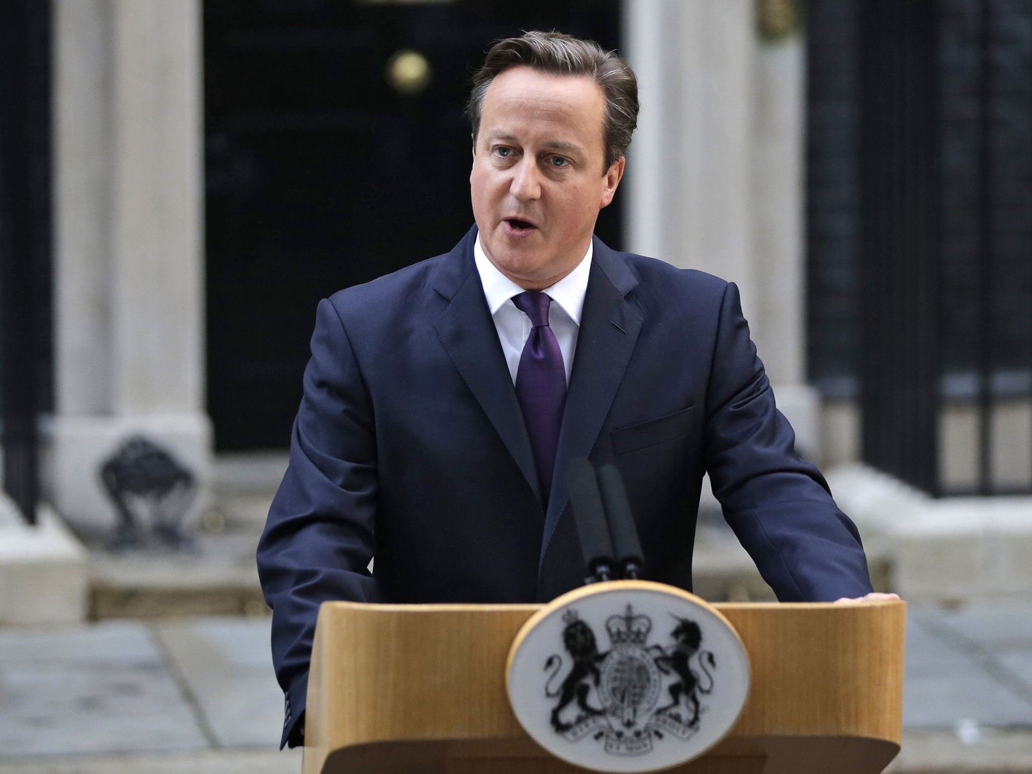 Prime Minister David Cameron reads a statement to the media about Scotland's referendum results outside Downing Street