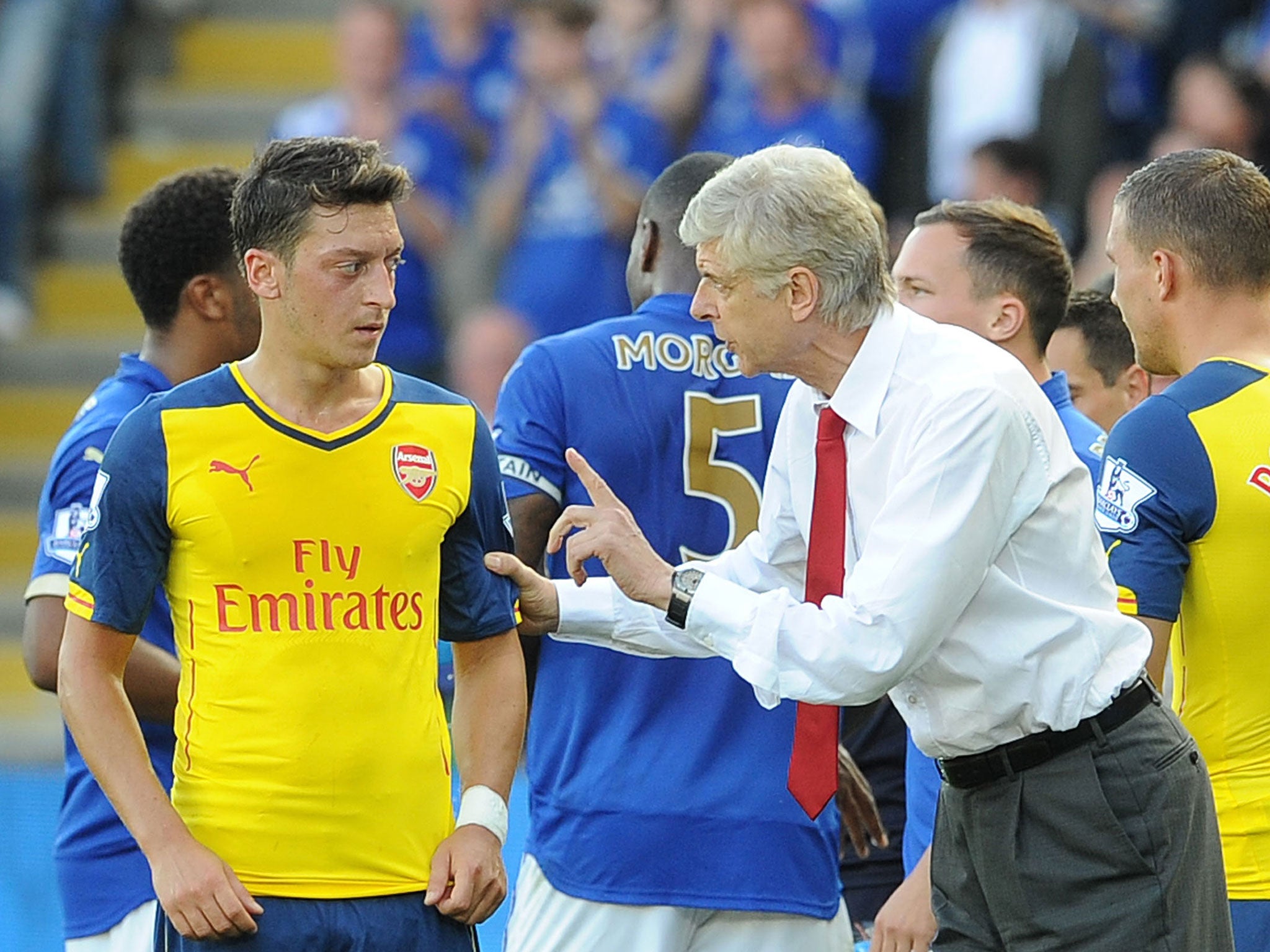 Mesut Ozil and Arsene Wenger