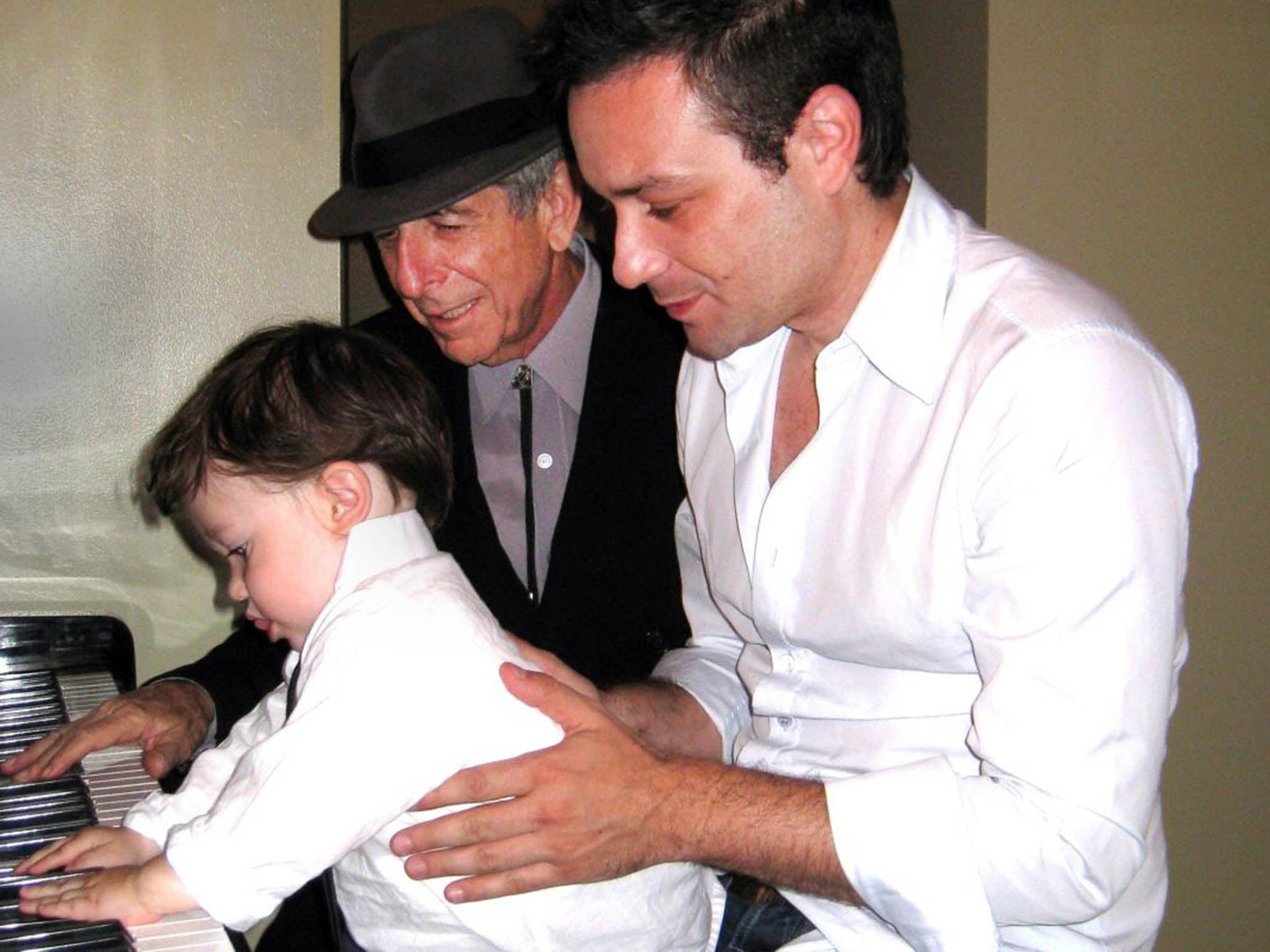 Cohen with son Adam and grandson Cassius