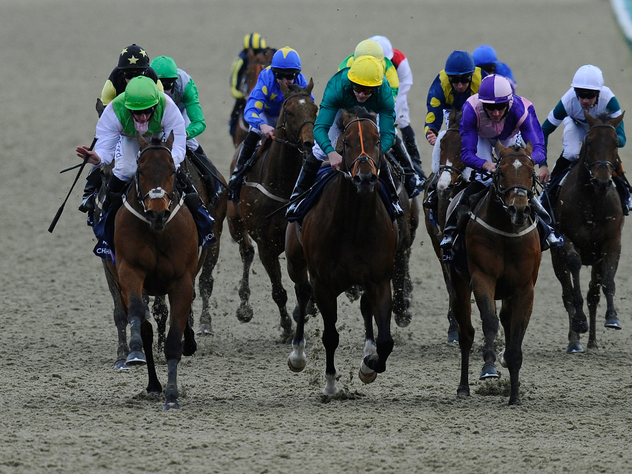 Paul Hanagan riding Alben Star (L) win The Bookmakers.co.uk All-Weather Sprint Championships Conditions Stakes at Lingfield racecourse on April