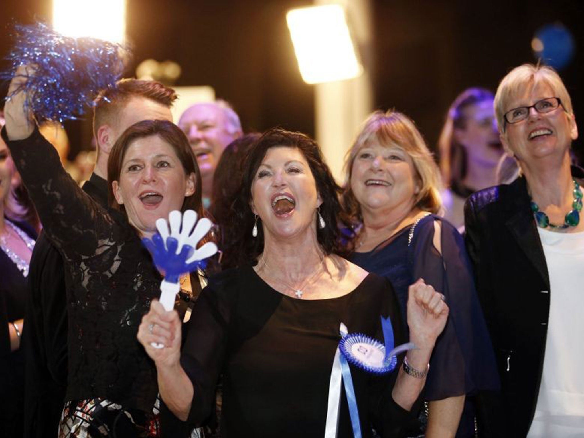 National Party supporters celebrate a landslide victory during New Zealand's general election