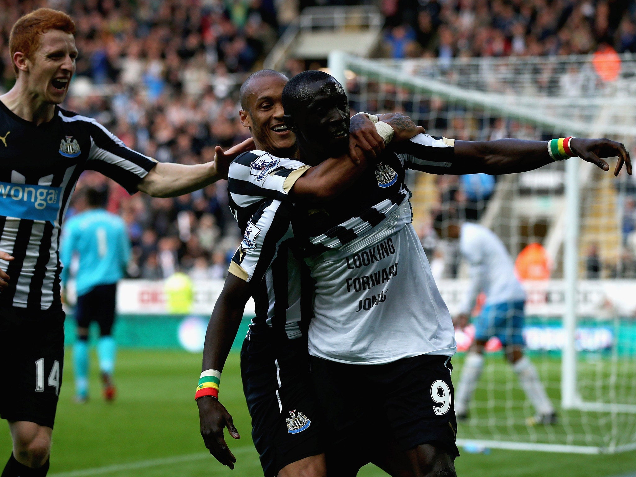 Papiss Cisse celebrates after equalising for Newcastle