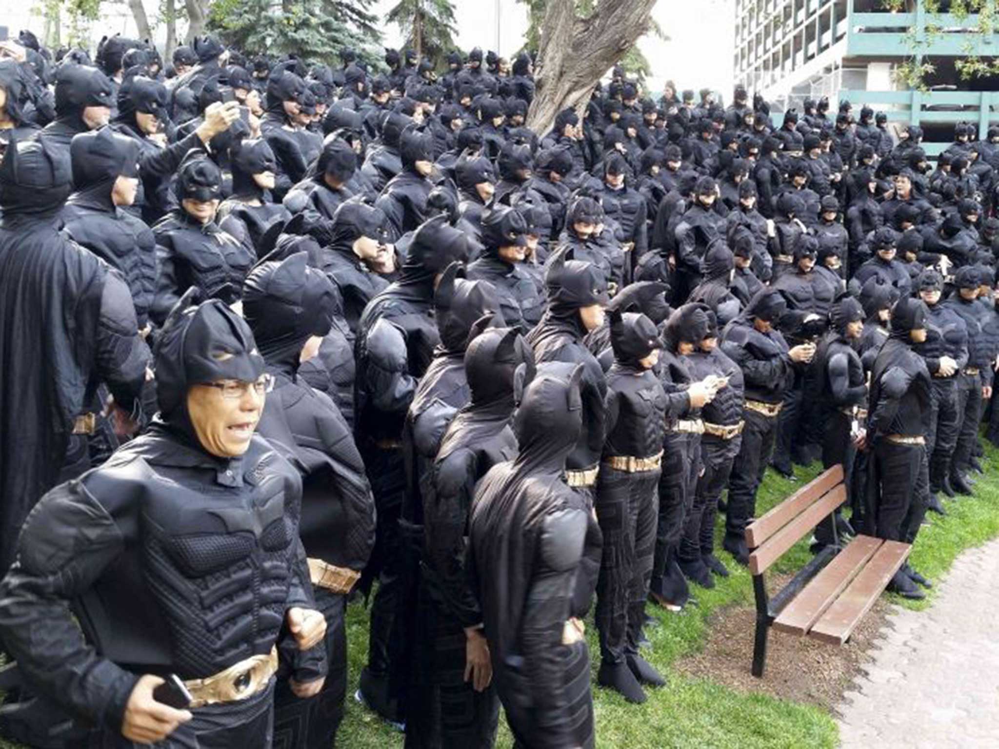 542 employees of the Nexen Energy company gather in a park in Calgary, Alberta