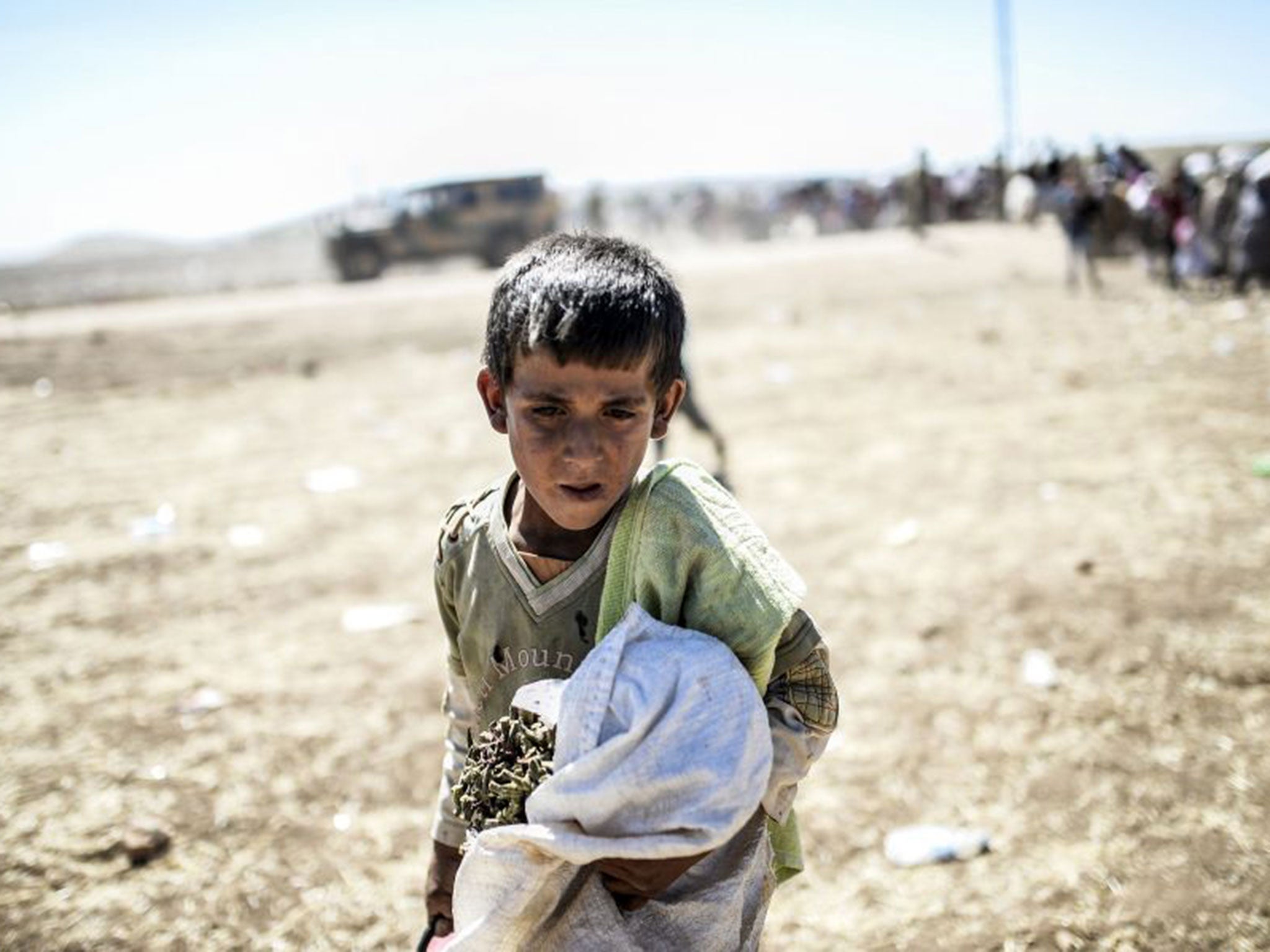 Nowhere child: a Syrian Kurd crosses the border to Turkey