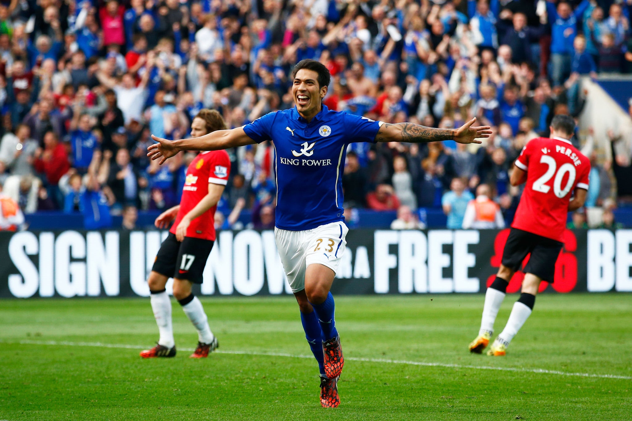 Leonardo Ulloa wheels away in celebration